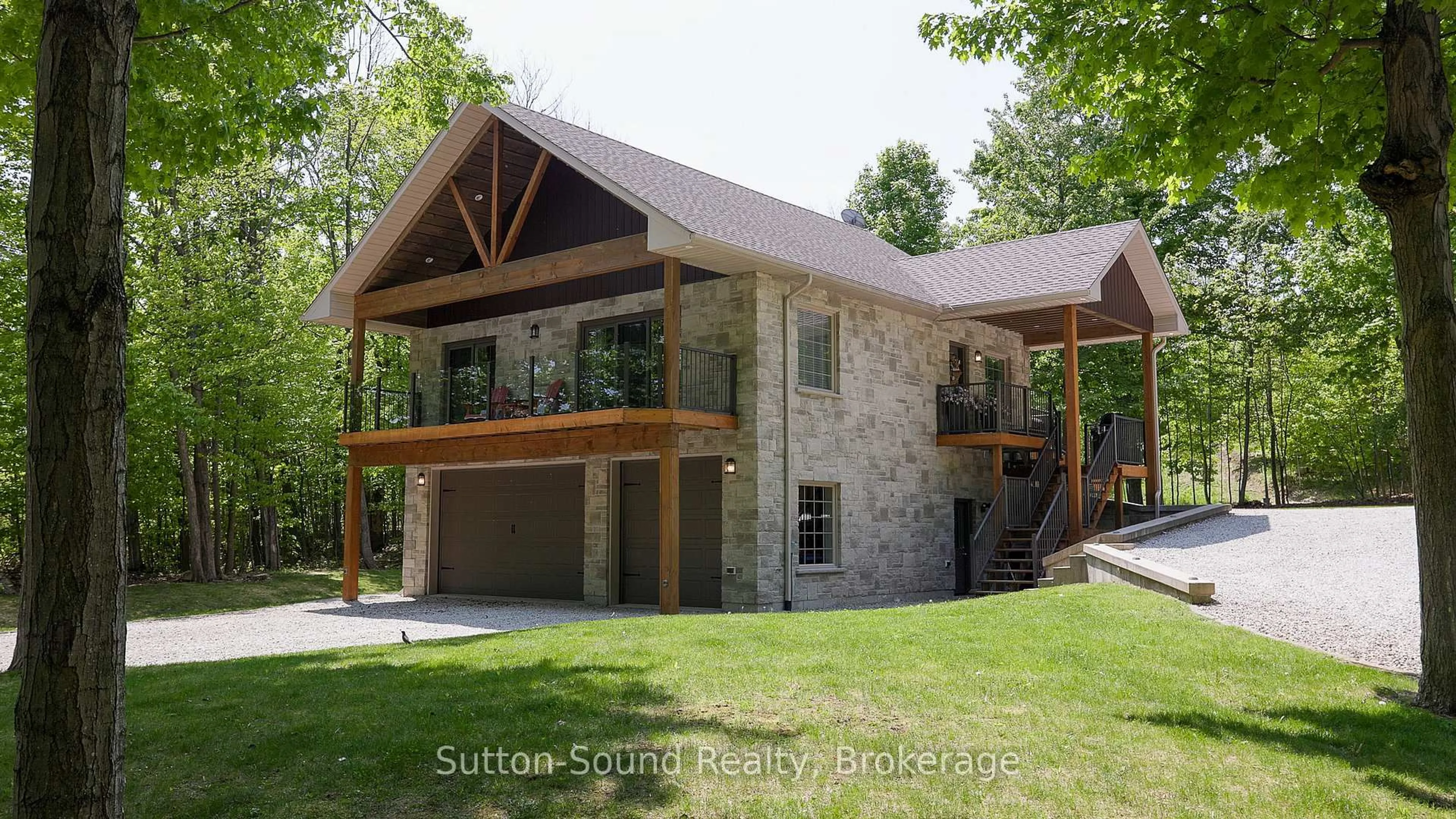 Home with brick exterior material, unknown for 505556 Grey Road 1 Rd, Georgian Bluffs Ontario N0H 1S0