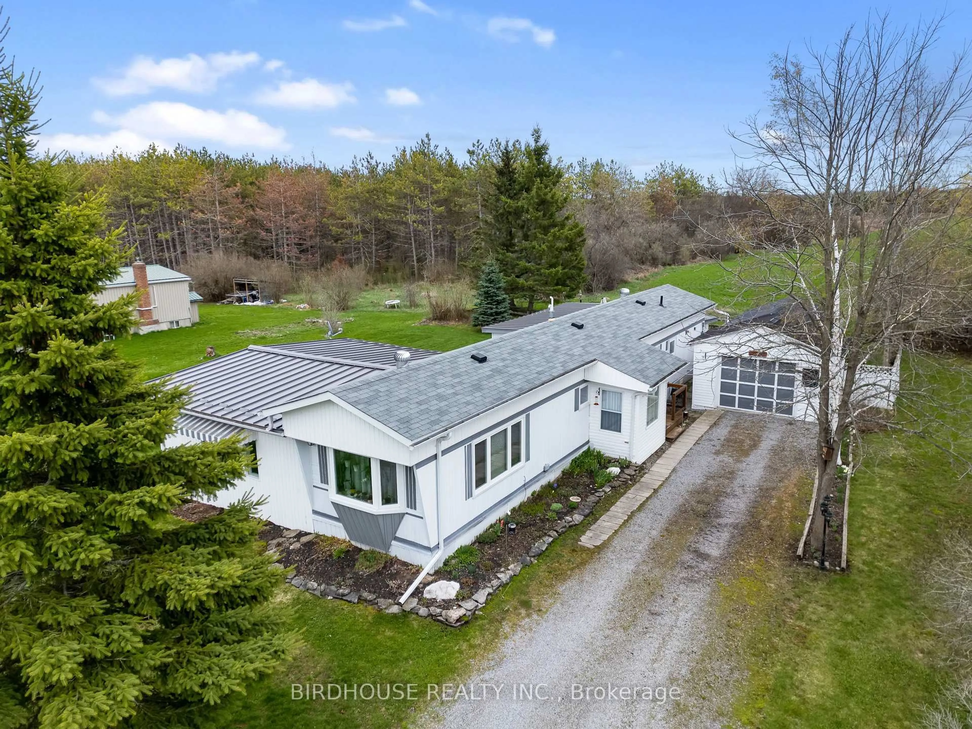 A pic from outside/outdoor area/front of a property/back of a property/a pic from drone, unknown for 68 Glenway Dr, Kawartha Lakes Ontario K0M 1L0