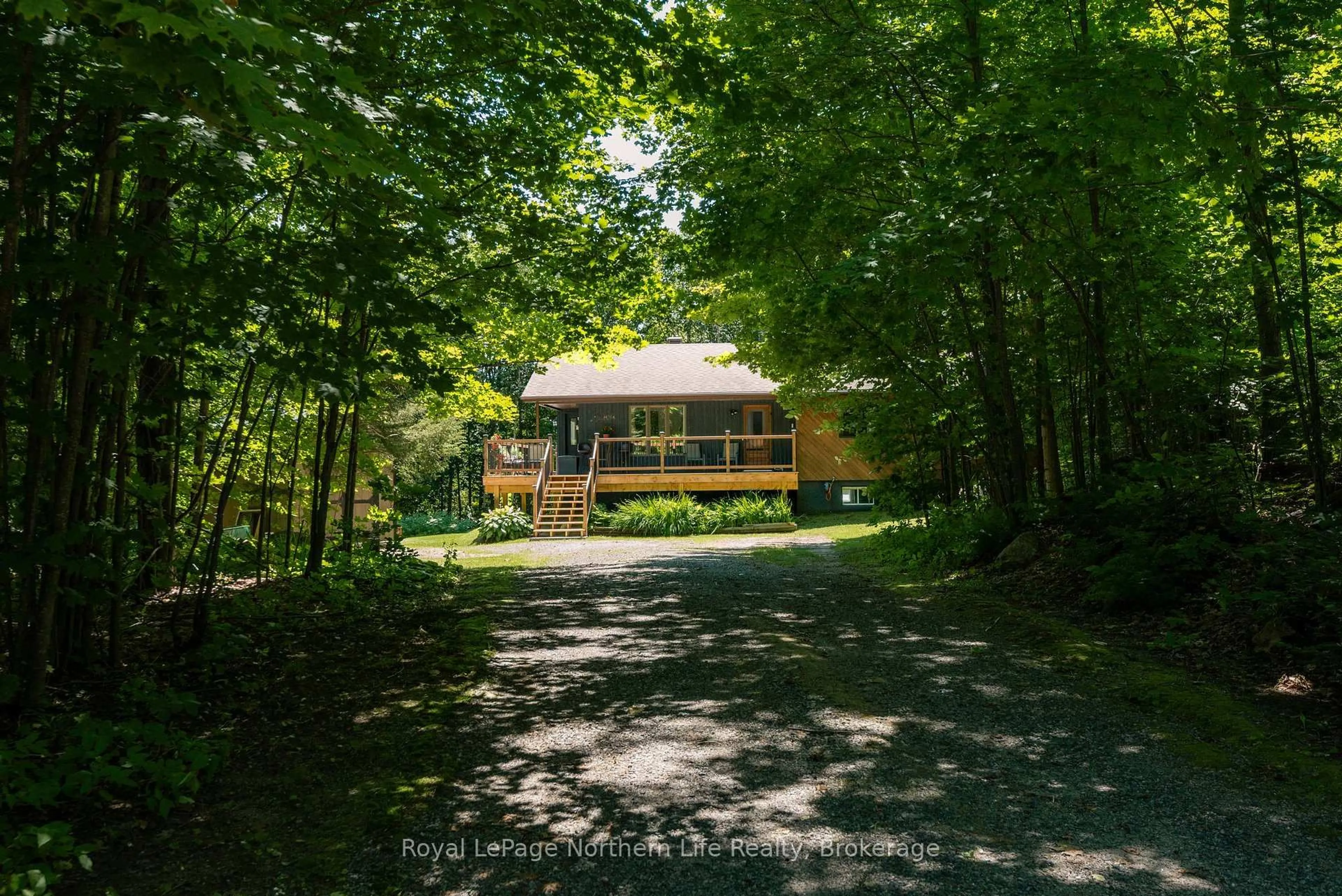 A pic from outside/outdoor area/front of a property/back of a property/a pic from drone, forest/trees view for 106 Lakeview Crt, Bonfield Ontario P0H 1E0
