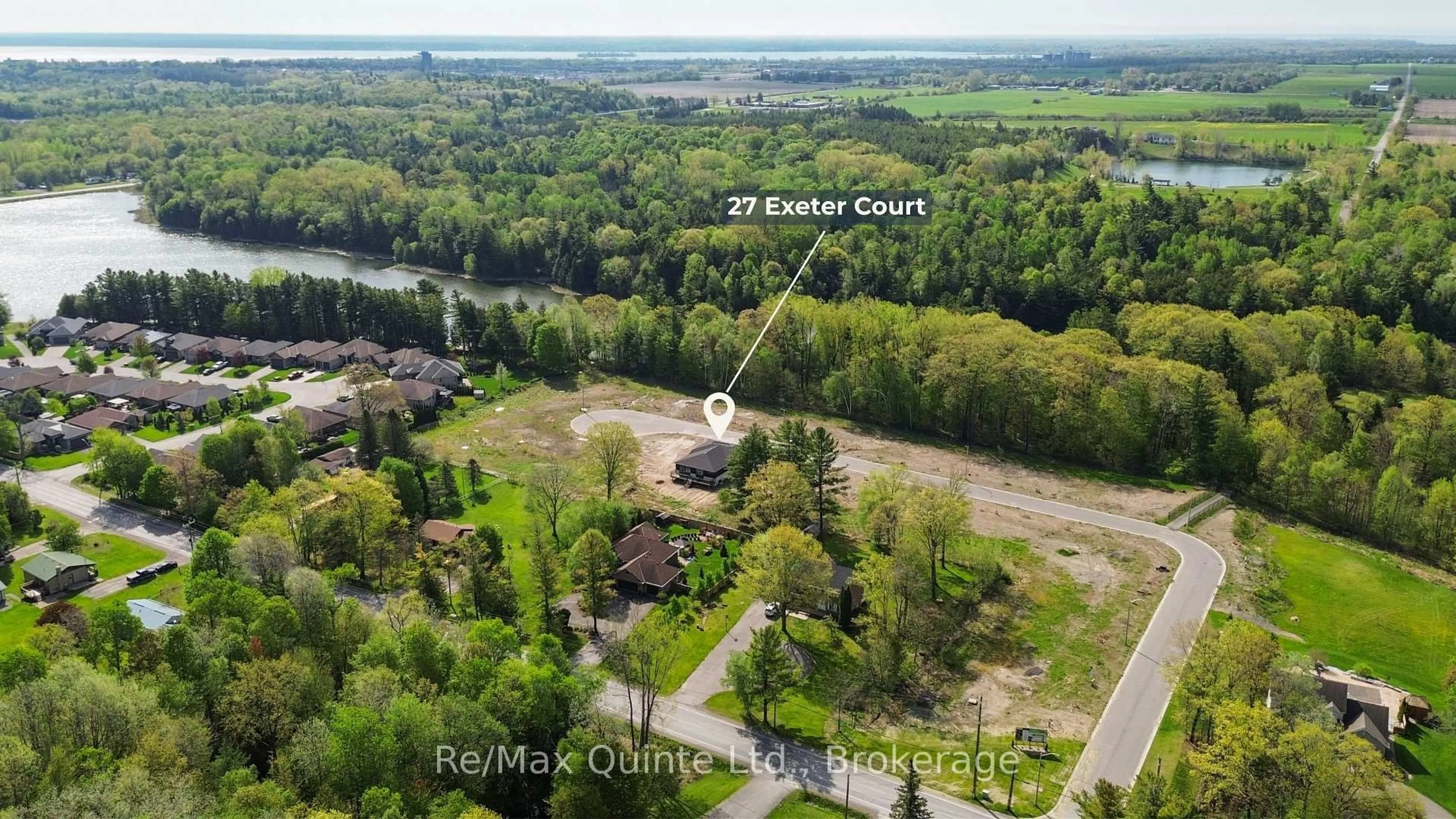 A pic from outside/outdoor area/front of a property/back of a property/a pic from drone, water/lake/river/ocean view for 27 Exeter Crt, Ingleside Ontario K8V 5P4