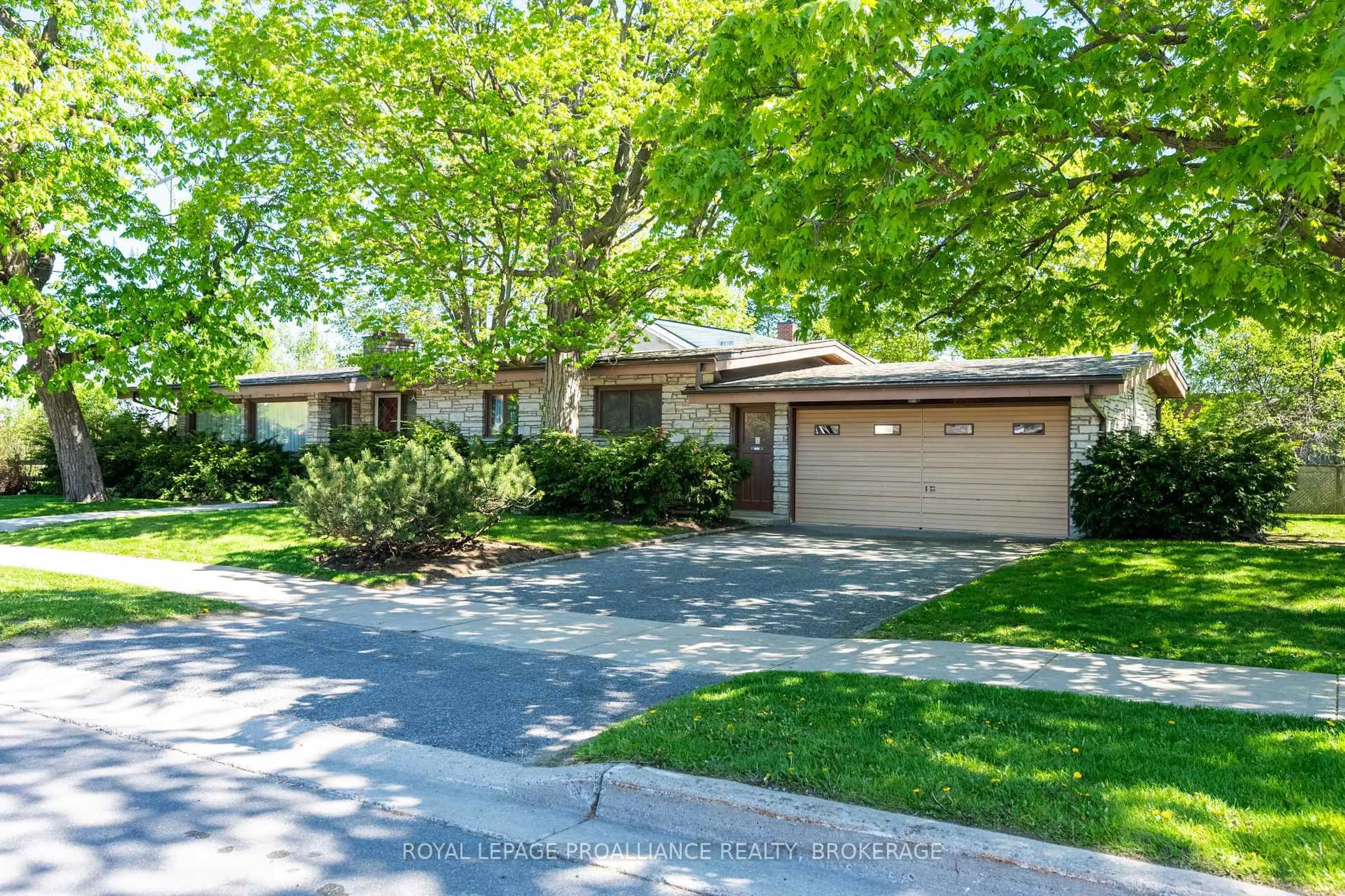 Home with brick exterior material, street for 2 Churchill St, Kingston Ontario K7M 2K5