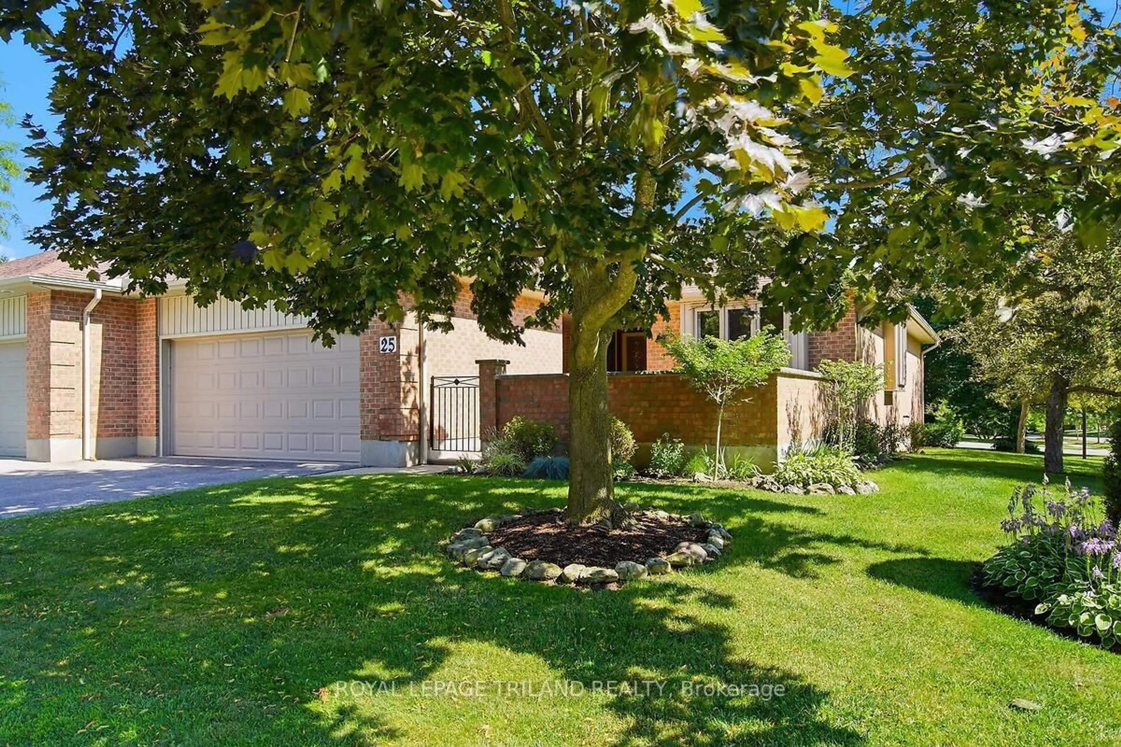 A pic from outside/outdoor area/front of a property/back of a property/a pic from drone, street for 5 Cadeau Terr #25, London South Ontario N6K 4H1