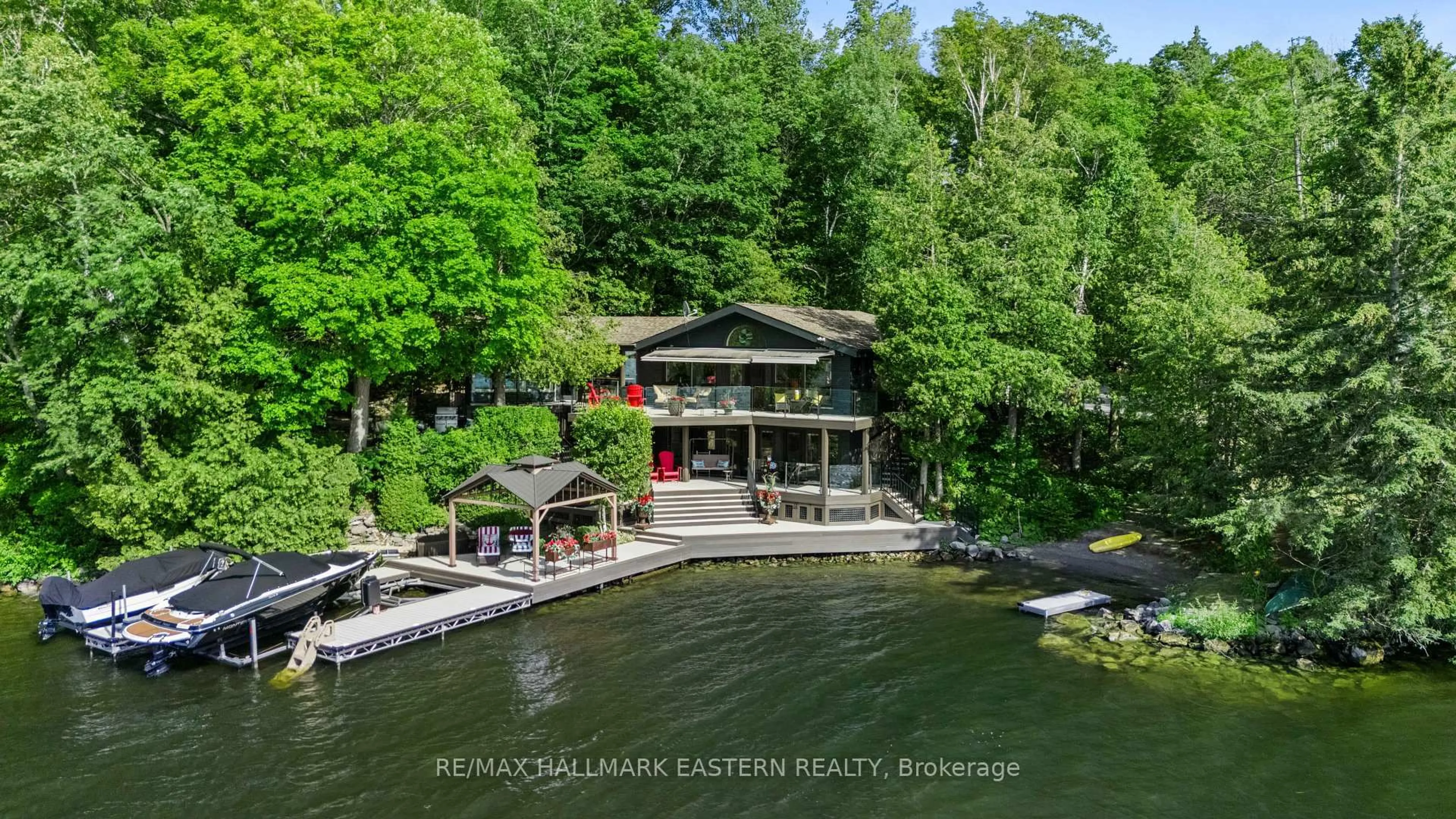 A pic from outside/outdoor area/front of a property/back of a property/a pic from drone, water/lake/river/ocean view for 1052 Tedford Lane, Douro-Dummer Ontario K0L 2H0