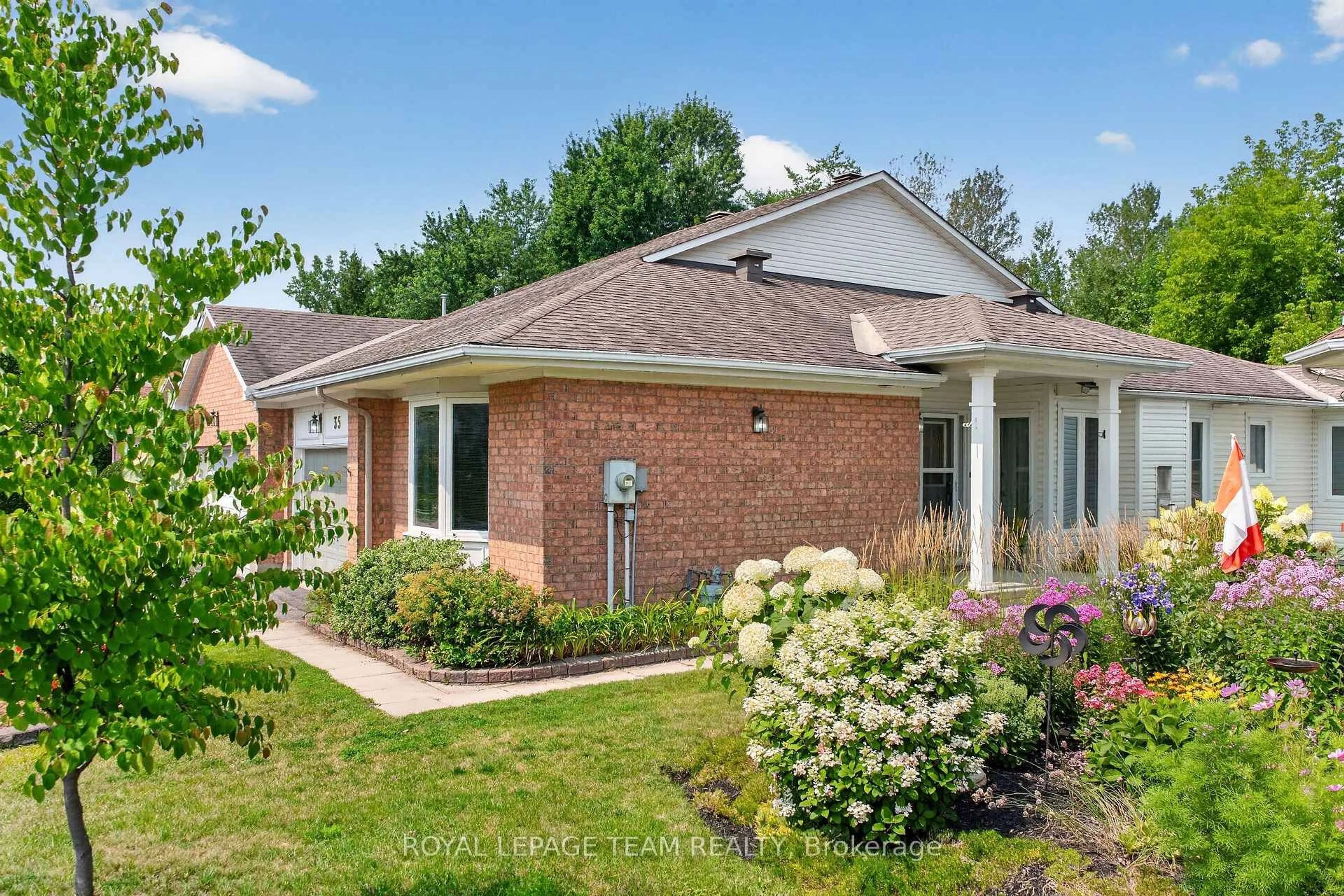 Home with brick exterior material, street for 35 Billingham Cres, Ottawa Ontario K2K 2T7