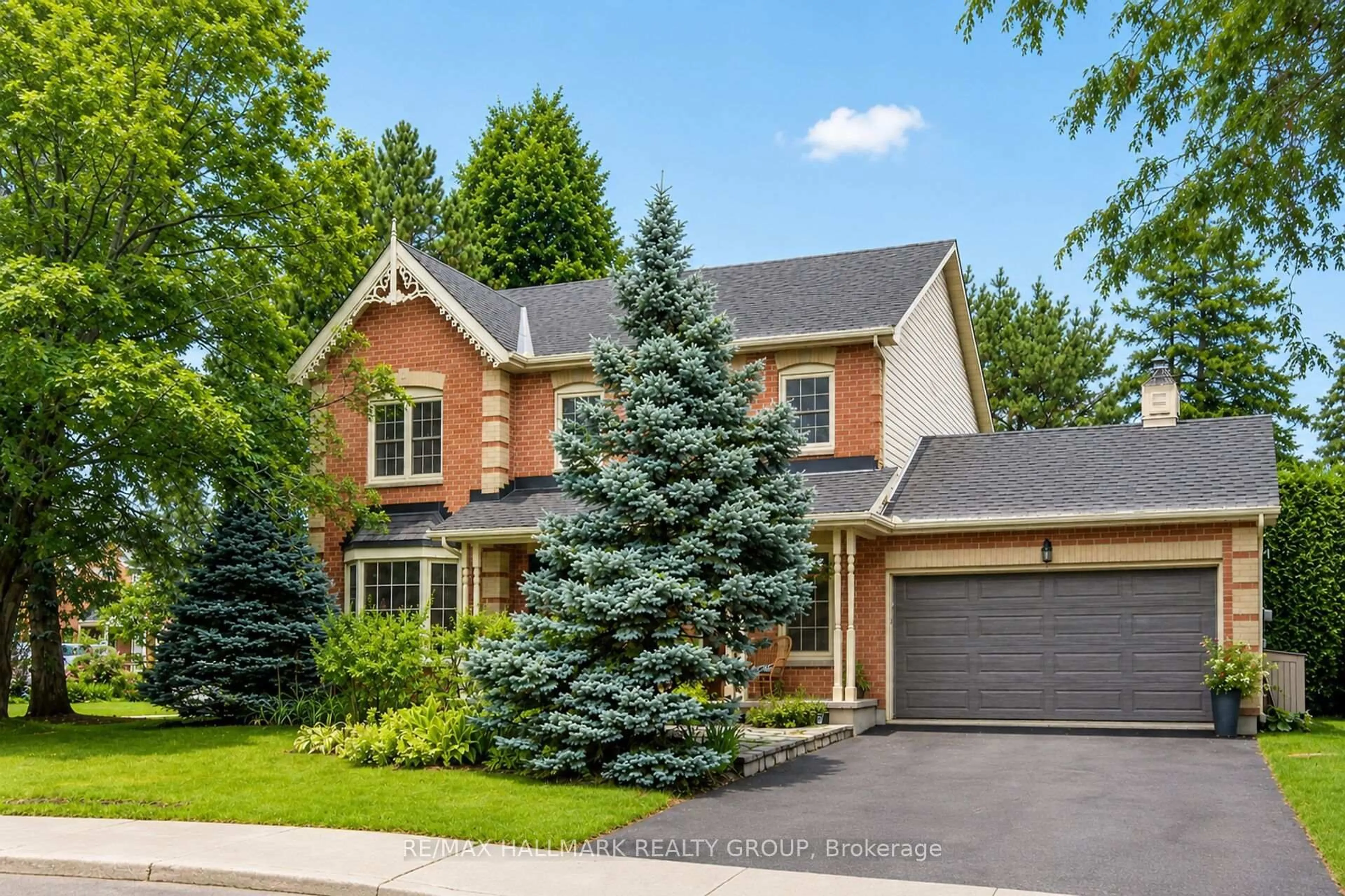 Home with brick exterior material, street for 21 Delamere Dr, Stittsville Ontario K2S 1G7