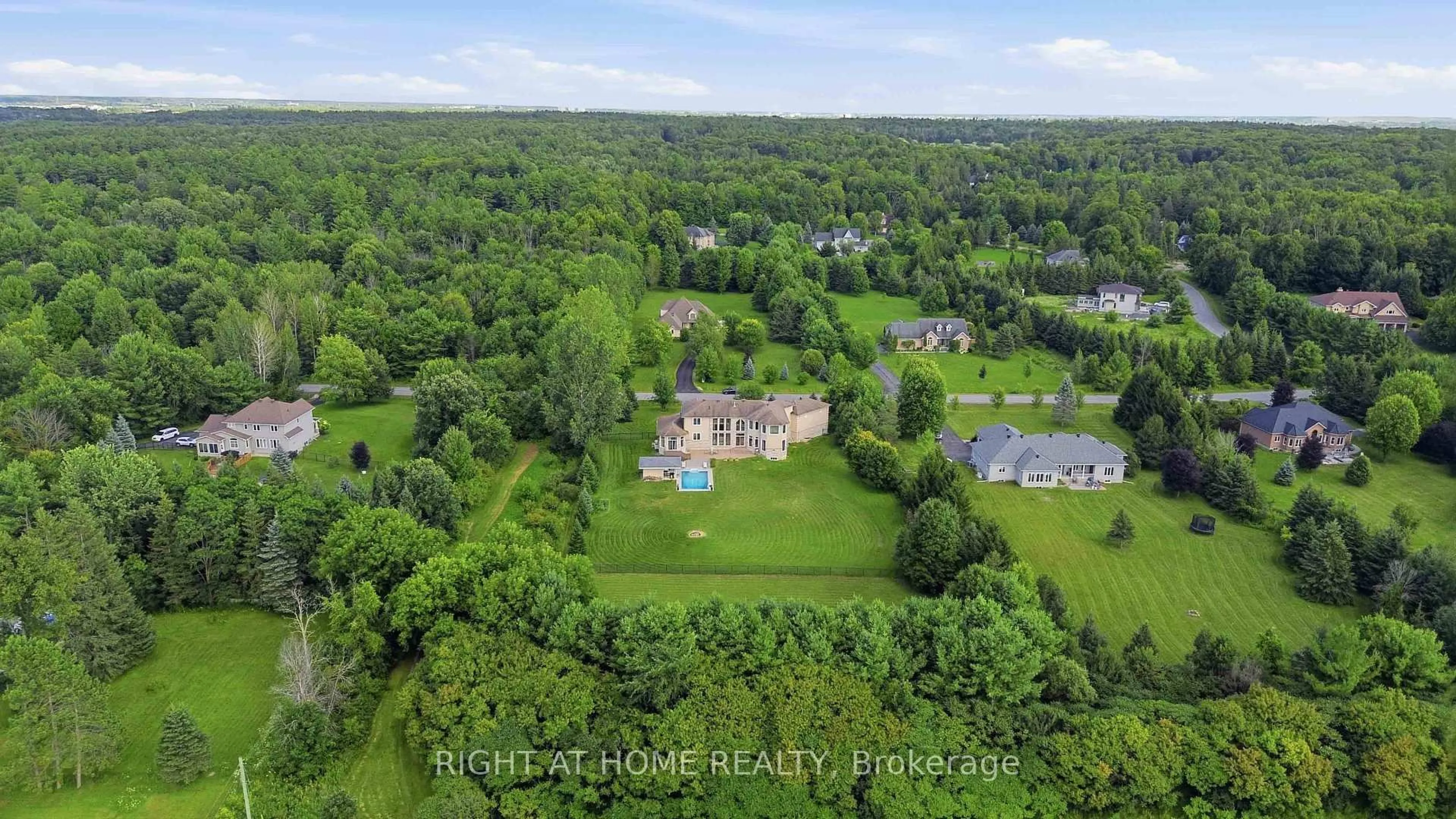 A pic from outside/outdoor area/front of a property/back of a property/a pic from drone, water/lake/river/ocean view for 1607 Landel Dr, Ottawa Ontario K2W 1C2