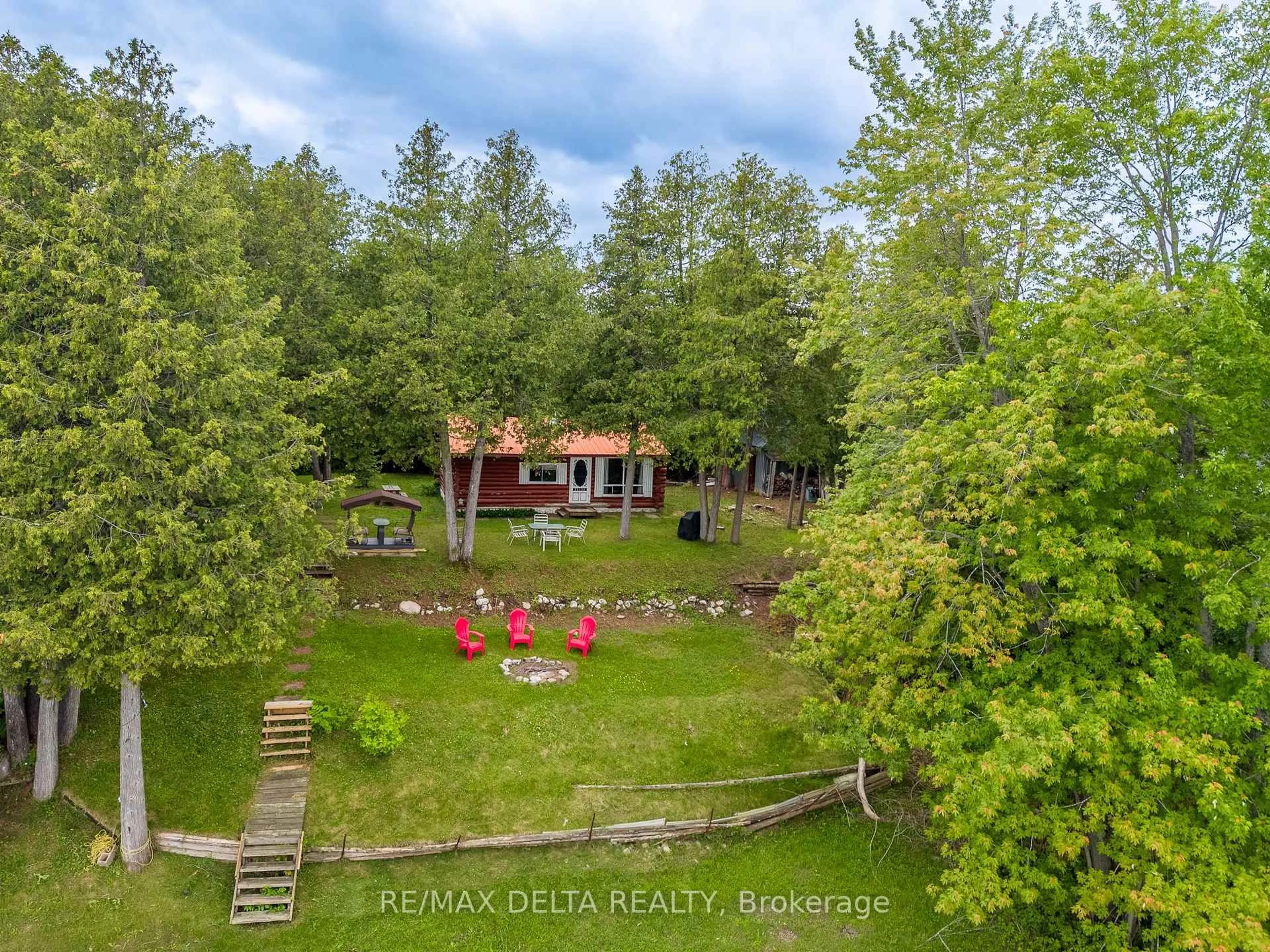 A pic from outside/outdoor area/front of a property/back of a property/a pic from drone, forest/trees view for 48 CROSBY Tr, Round Lake Centre Ontario K0J 2J0