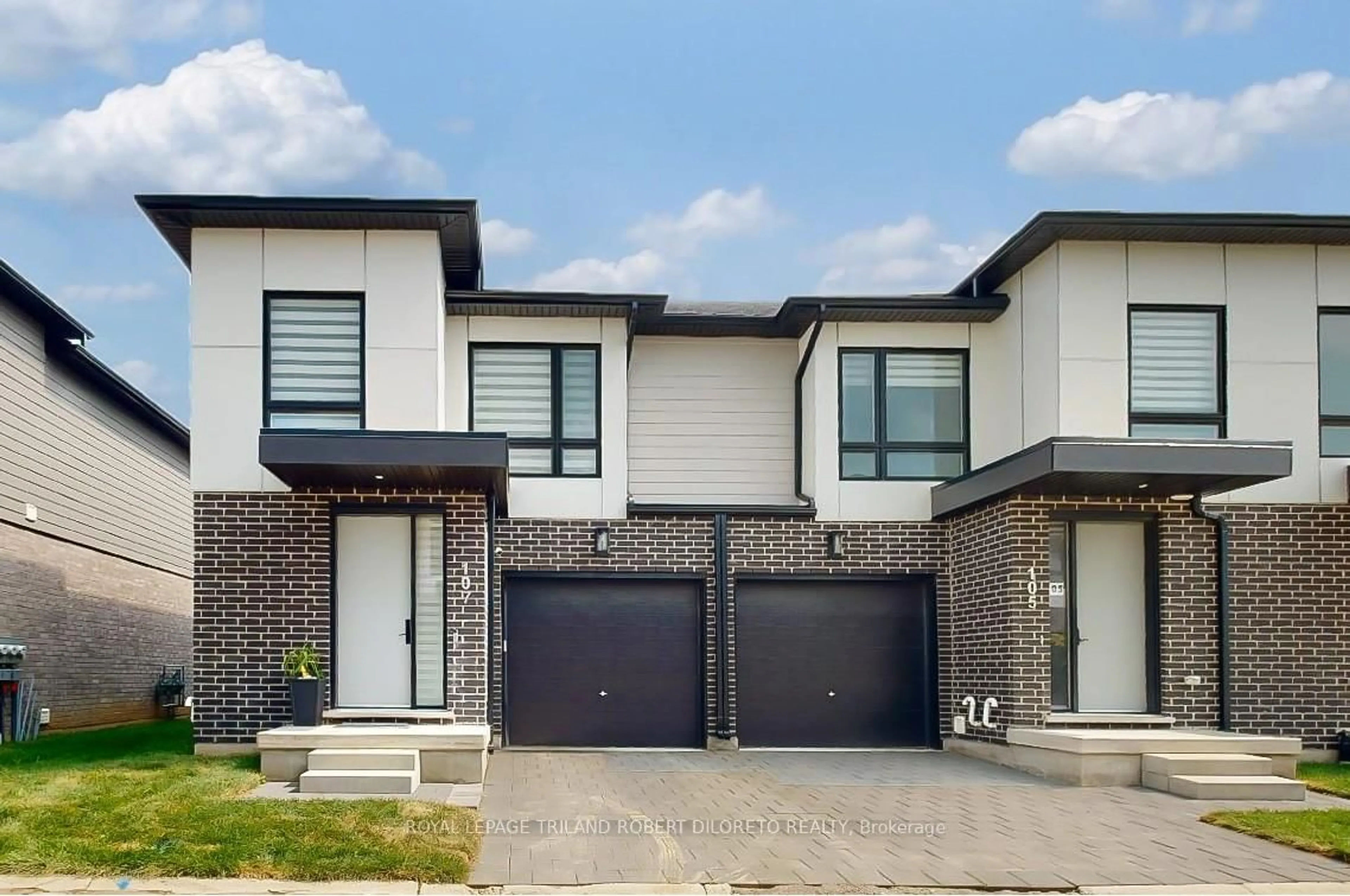Home with brick exterior material, street for 175 Doan Dr #107, Middlesex Centre Ontario N0L 1R0