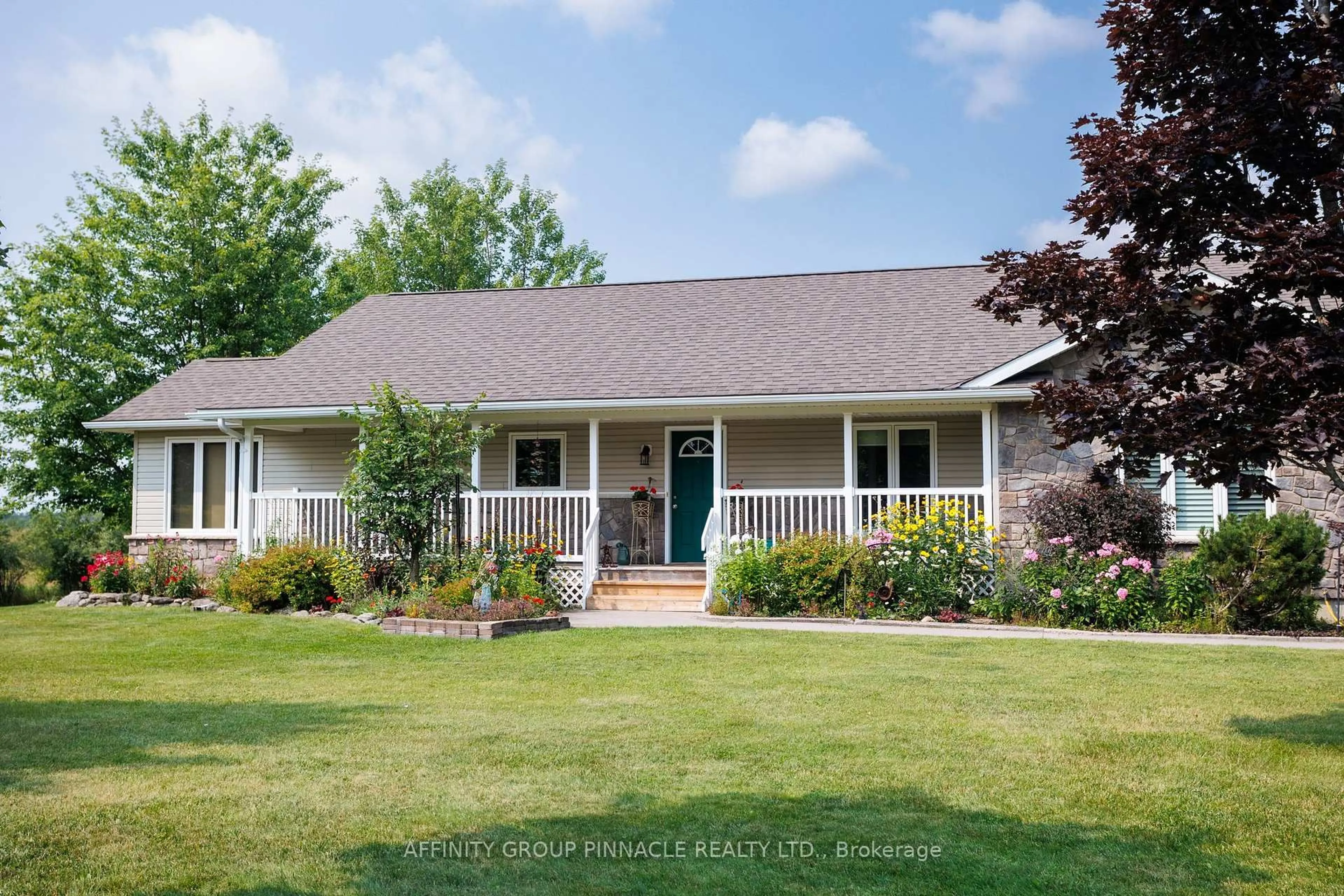 Home with vinyl exterior material, street for 243 Fairbairn Rd, Kawartha Lakes Ontario K0M 1A0