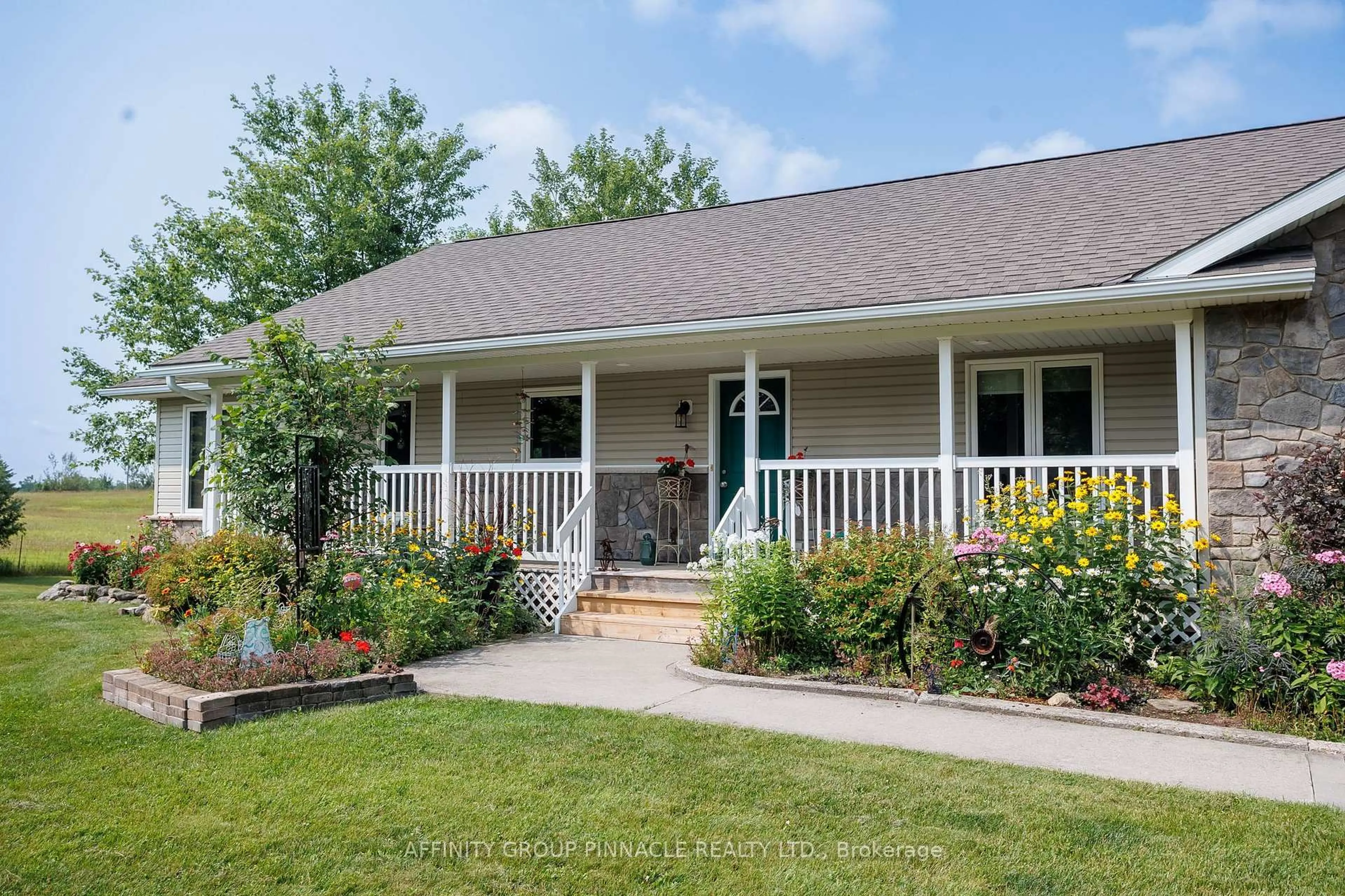 Home with vinyl exterior material, street for 243 Fairbairn Rd, Kawartha Lakes Ontario K0M 1A0