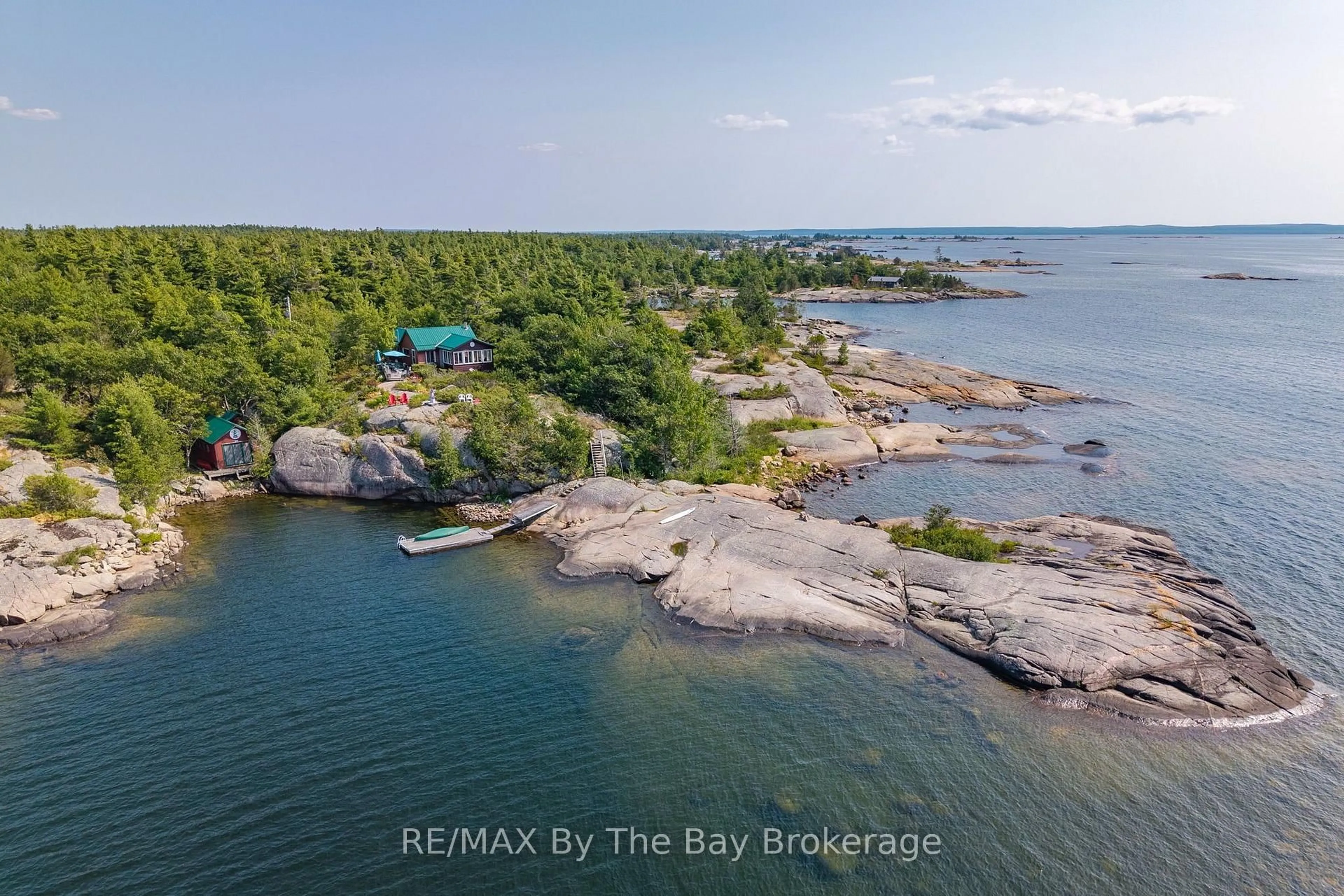 A pic from outside/outdoor area/front of a property/back of a property/a pic from drone, water/lake/river/ocean view for 28640 Georgian Bay Shore, Georgian Bay Ontario L0K 1S0