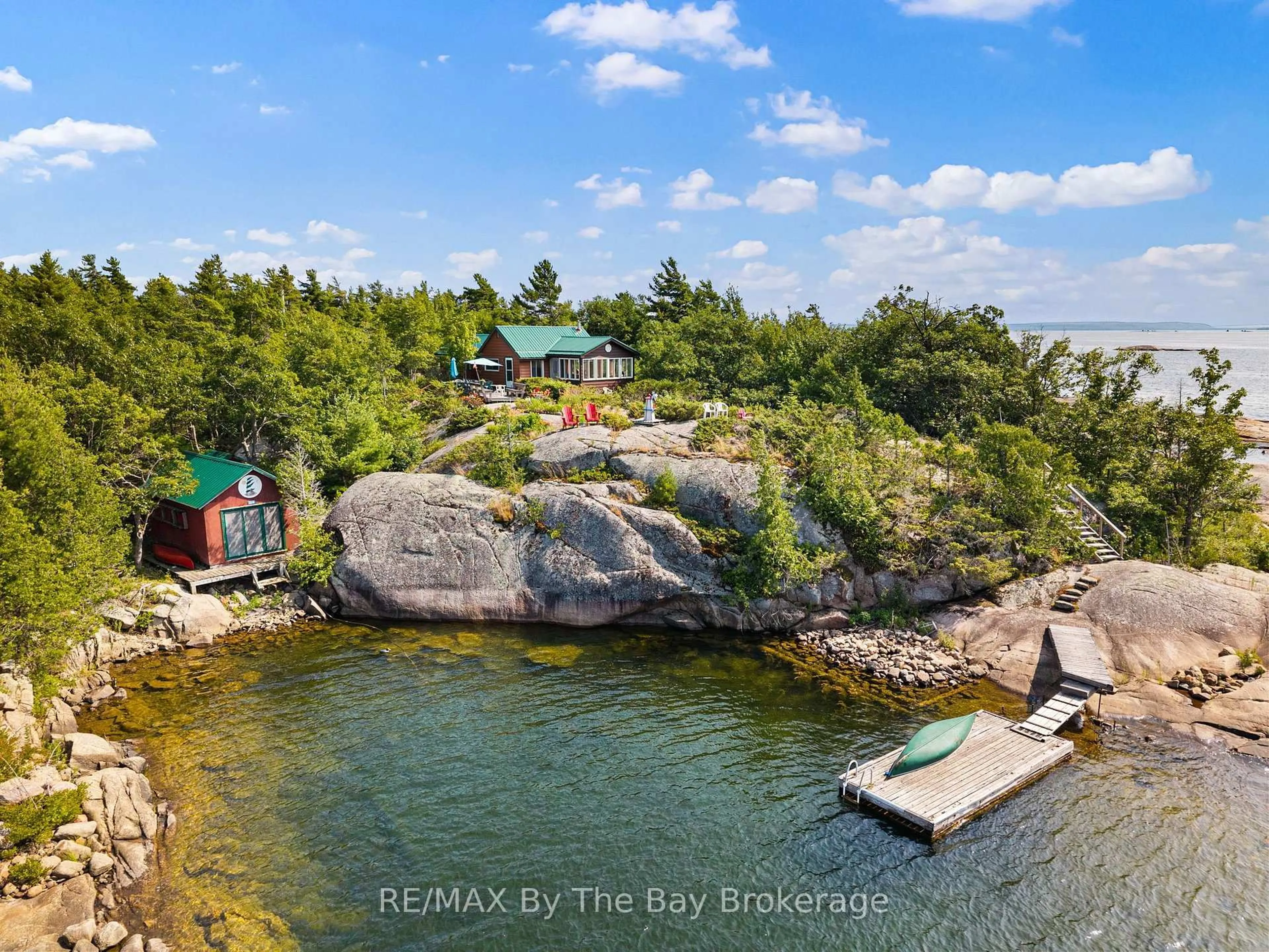 A pic from outside/outdoor area/front of a property/back of a property/a pic from drone, water/lake/river/ocean view for 28640 Georgian Bay Shore, Georgian Bay Ontario L0K 1S0