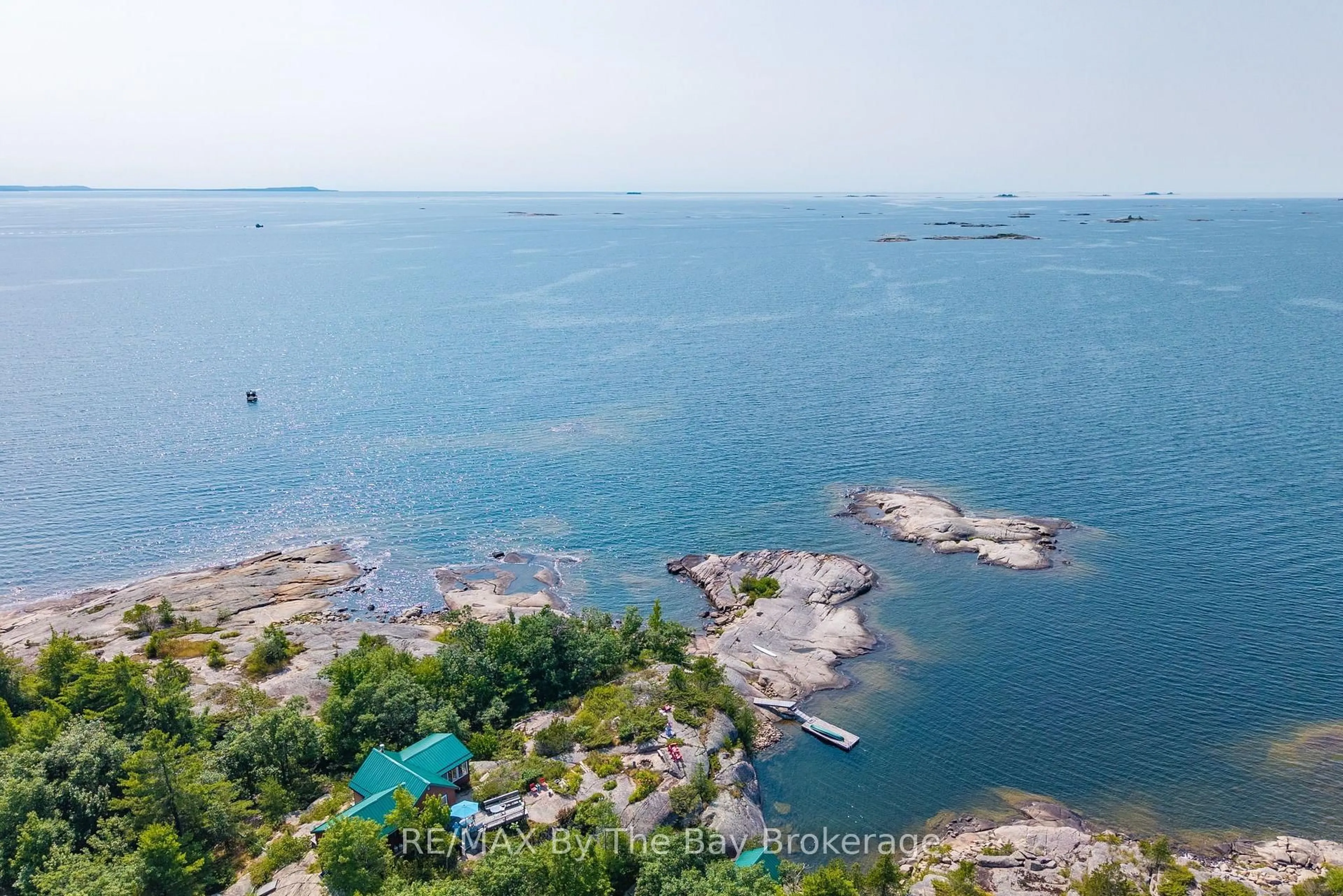 A pic from outside/outdoor area/front of a property/back of a property/a pic from drone, water/lake/river/ocean view for 28640 Georgian Bay Shore, Georgian Bay Ontario L0K 1S0