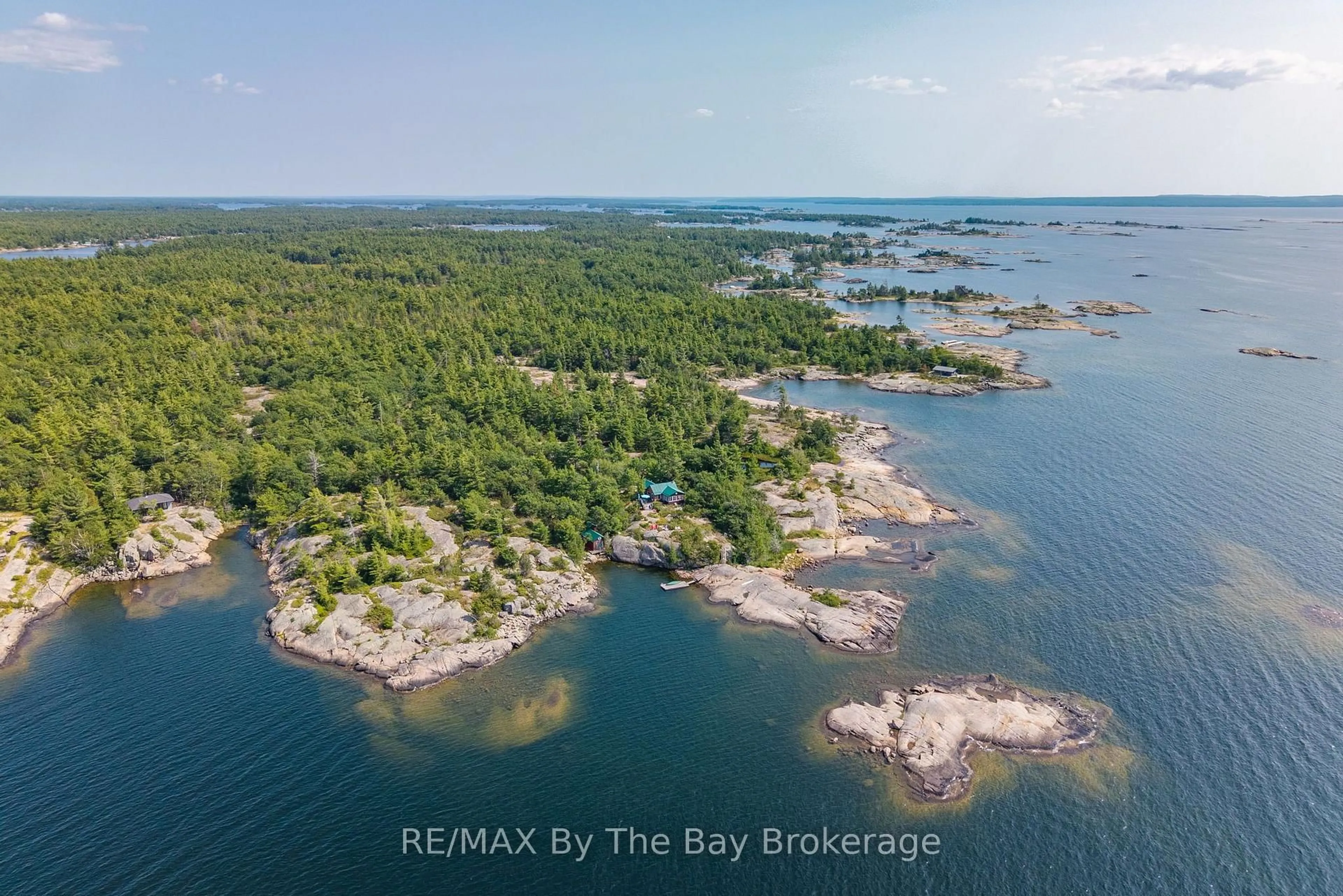 A pic from outside/outdoor area/front of a property/back of a property/a pic from drone, water/lake/river/ocean view for 28640 Georgian Bay Shore, Georgian Bay Ontario L0K 1S0
