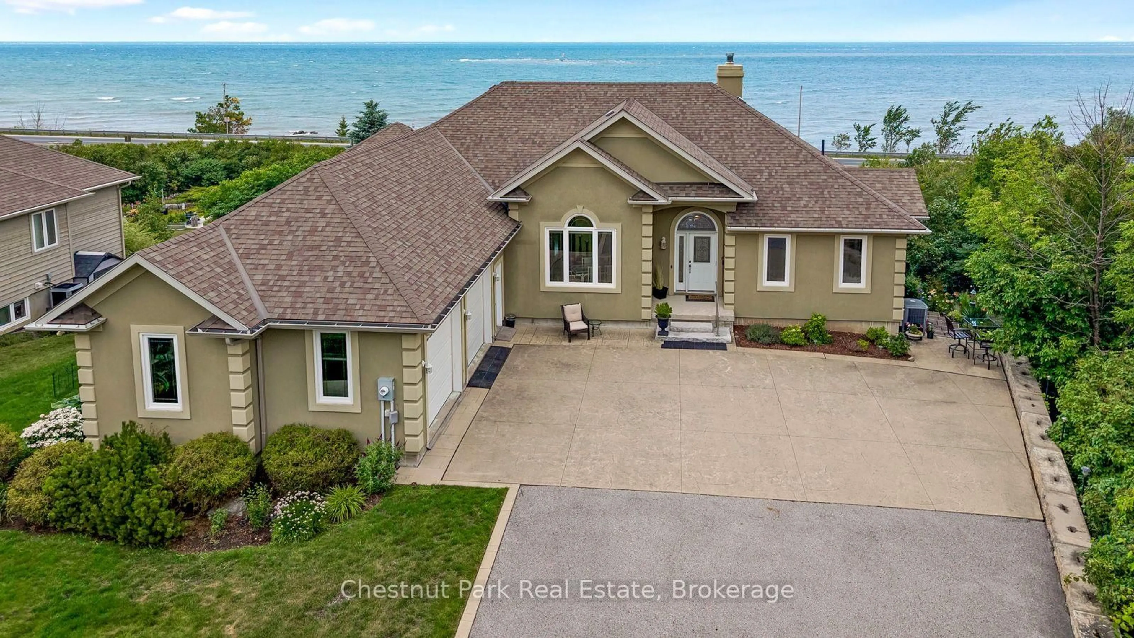 A pic from outside/outdoor area/front of a property/back of a property/a pic from drone, water/lake/river/ocean view for 133 Lakeshore Rd, Blue Mountains Ontario L9Y 0N1