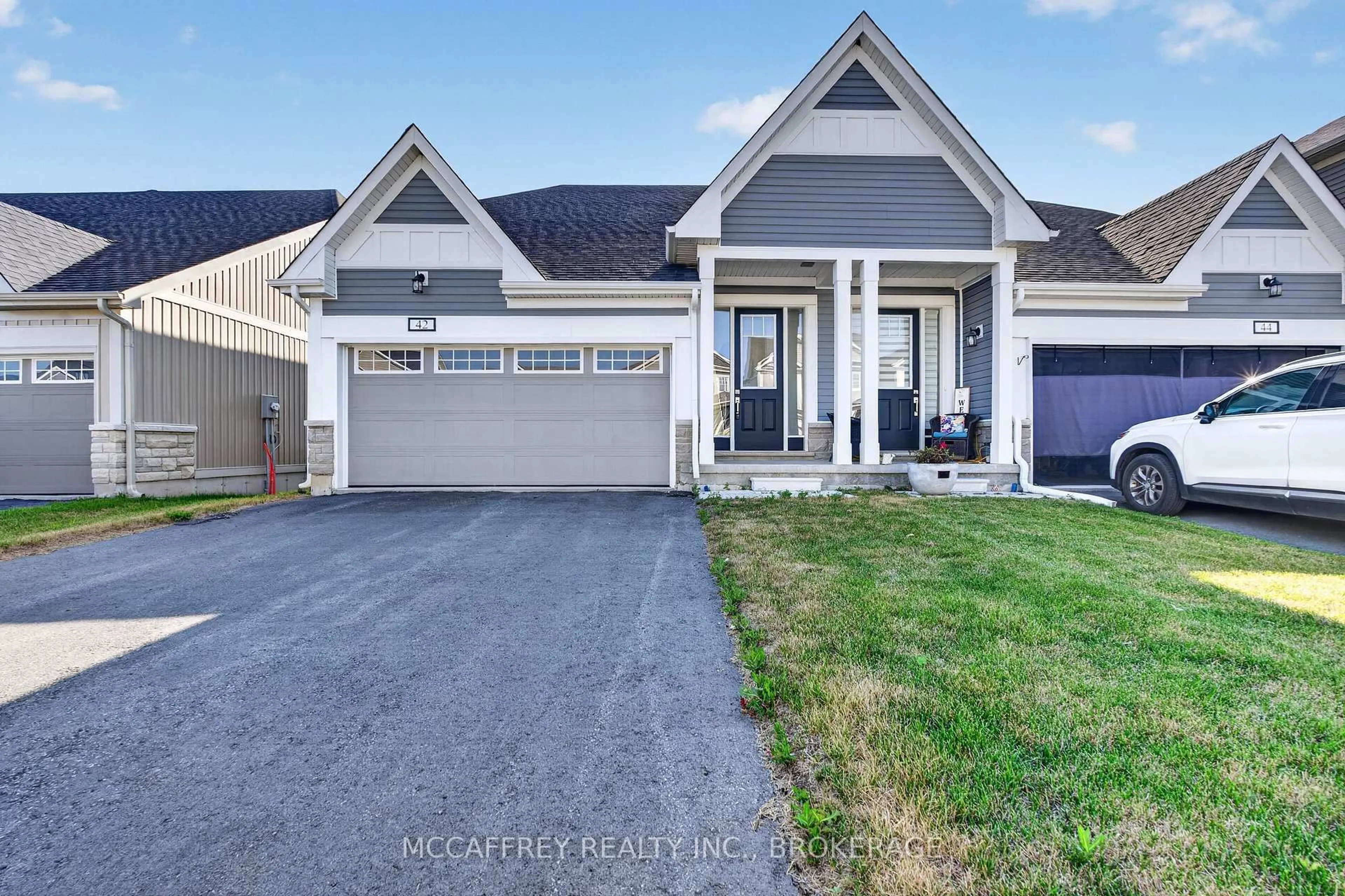 A pic from outside/outdoor area/front of a property/back of a property/a pic from drone, street for 42 Golf Links Dr, Bath Ontario K0H 1G0