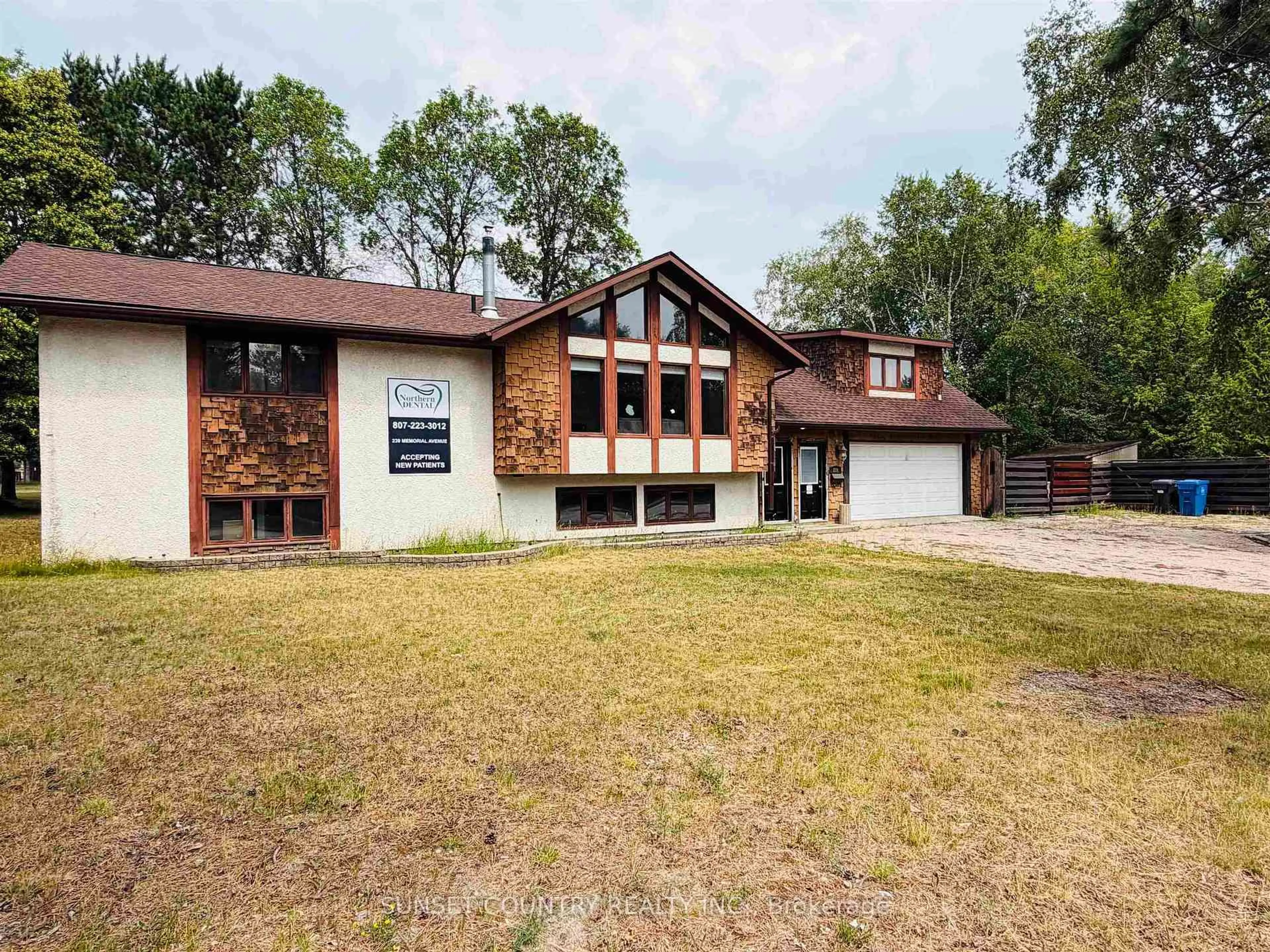 Home with brick exterior material, building for 239 Memorial Ave, Dryden Ontario P8N 2M6