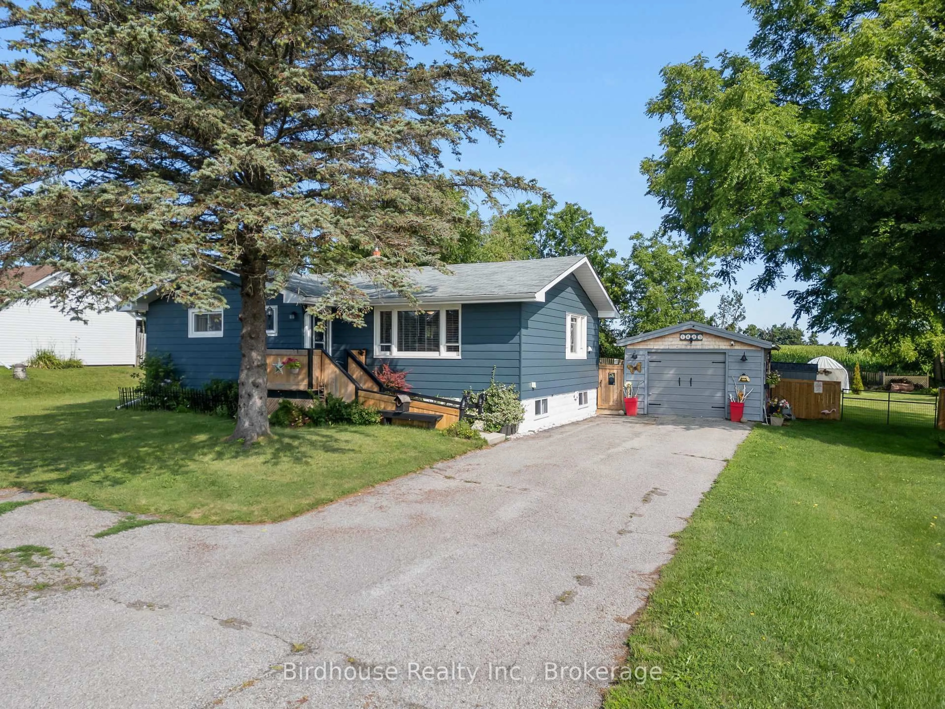 A pic from outside/outdoor area/front of a property/back of a property/a pic from drone, street for 1499 Highway 7, Kawartha Lakes Ontario K0M 2M0