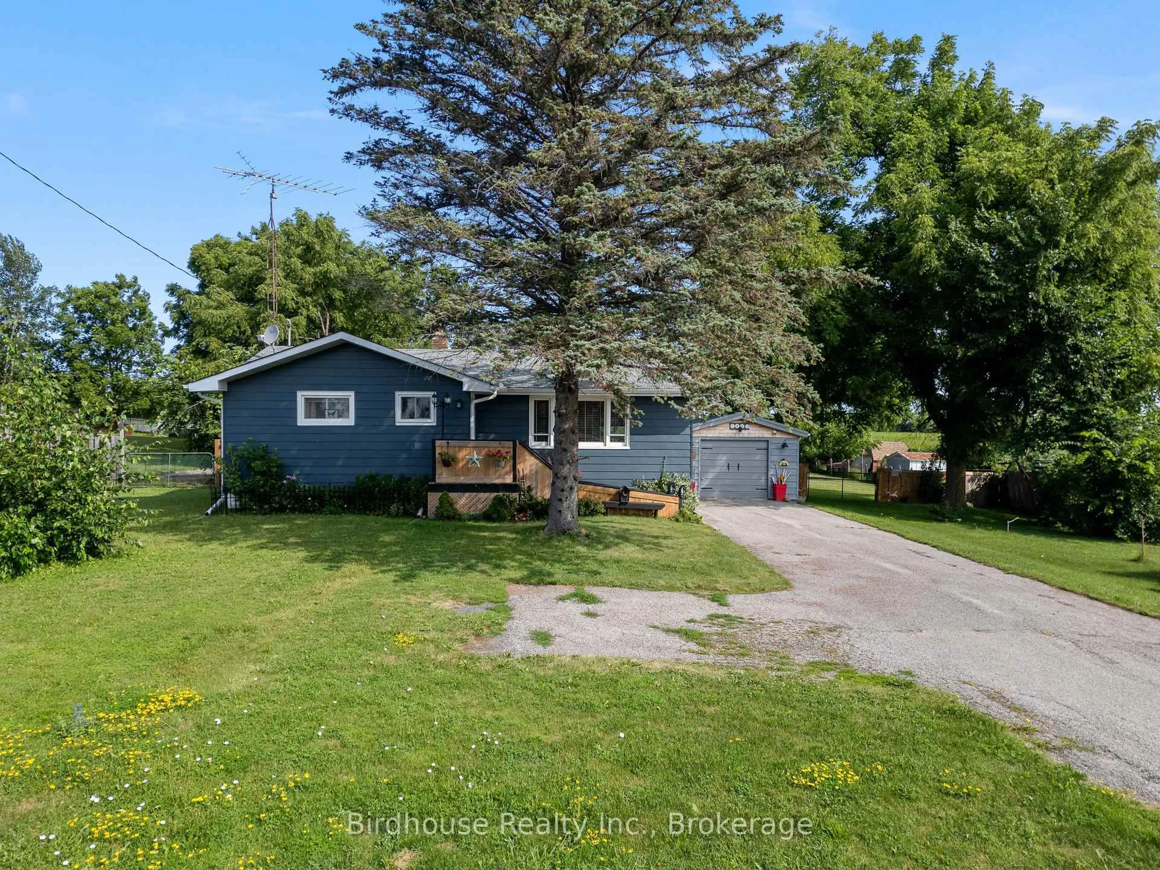 A pic from outside/outdoor area/front of a property/back of a property/a pic from drone, street for 1499 Highway 7, Kawartha Lakes Ontario K0M 2M0