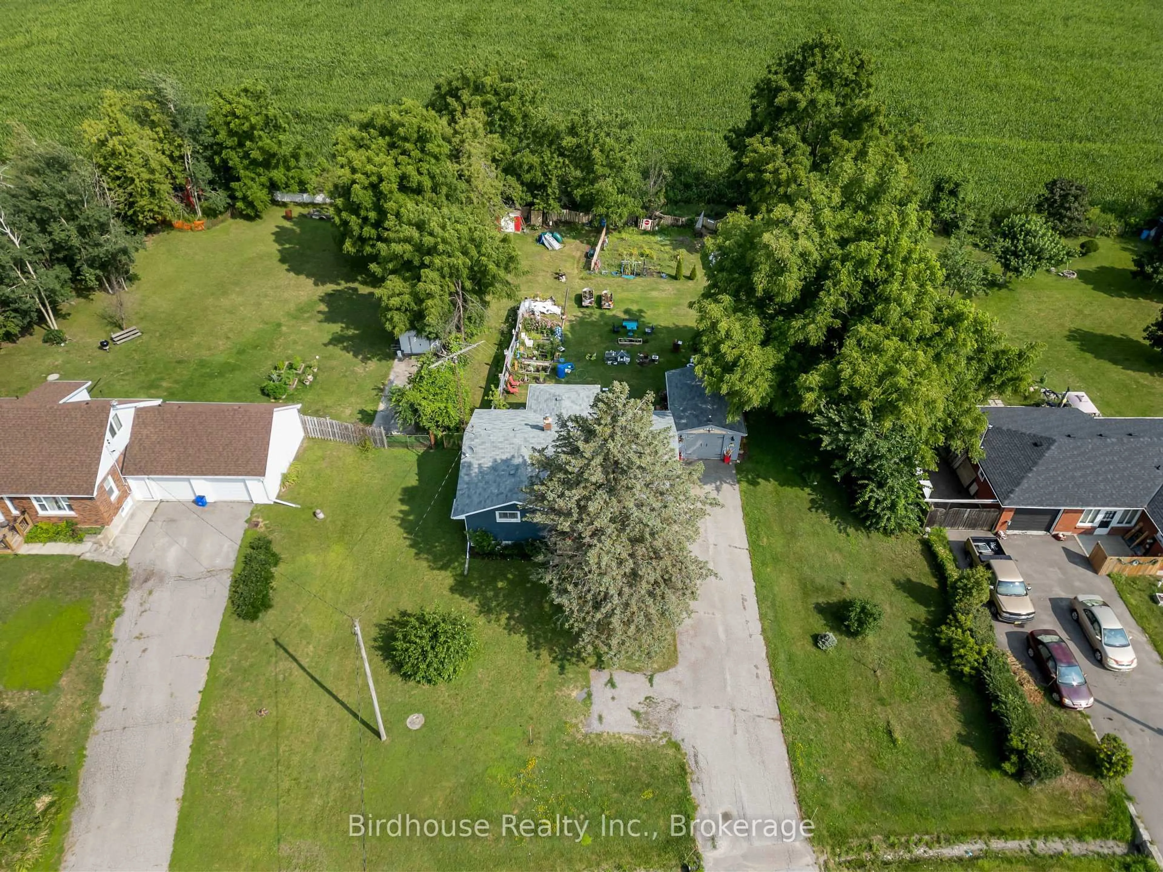 A pic from outside/outdoor area/front of a property/back of a property/a pic from drone, street for 1499 Highway 7, Kawartha Lakes Ontario K0M 2M0
