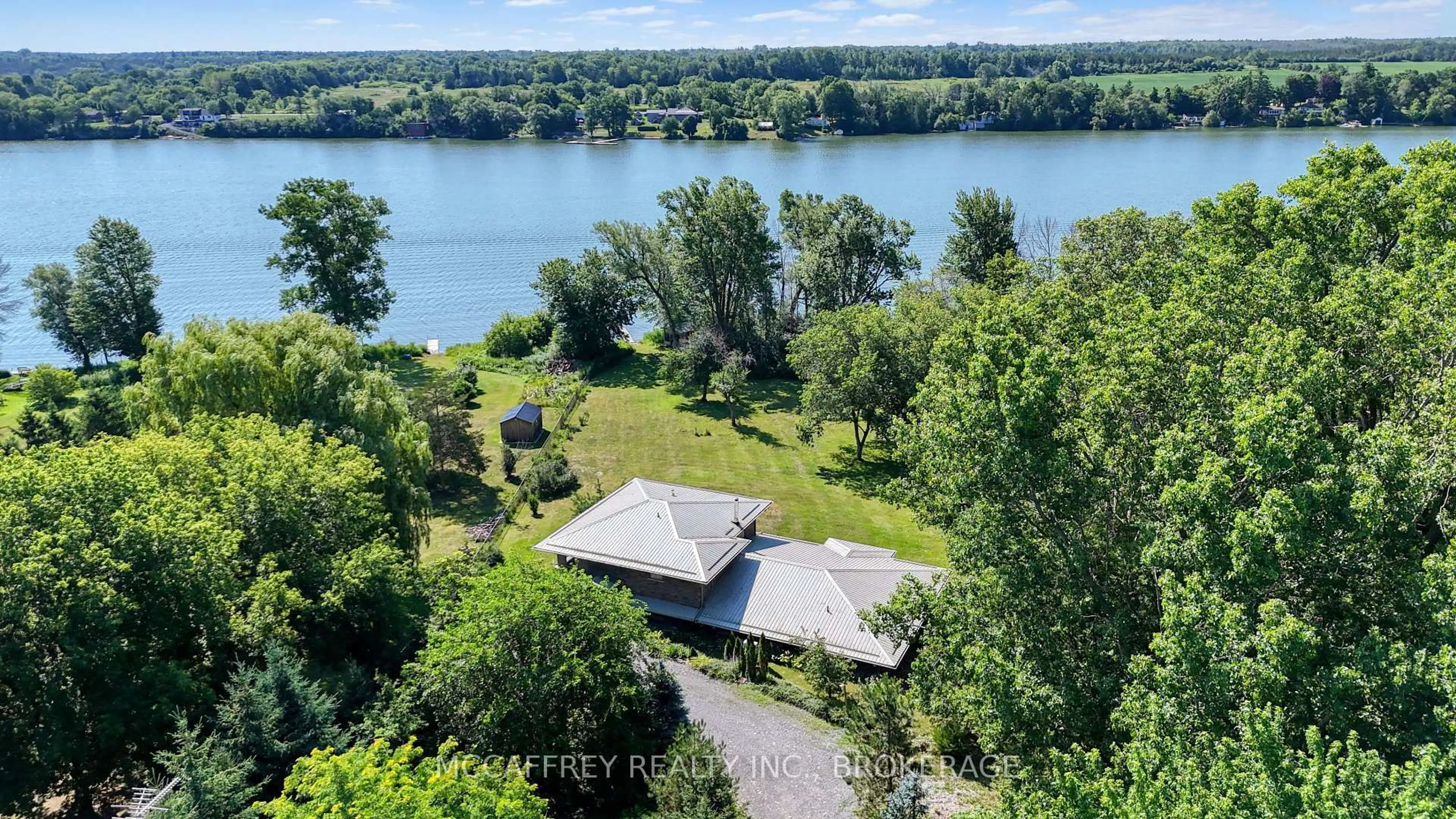 A pic from outside/outdoor area/front of a property/back of a property/a pic from drone, water/lake/river/ocean view for 5255 County Road 9, Napanee Ontario K7R 3K8
