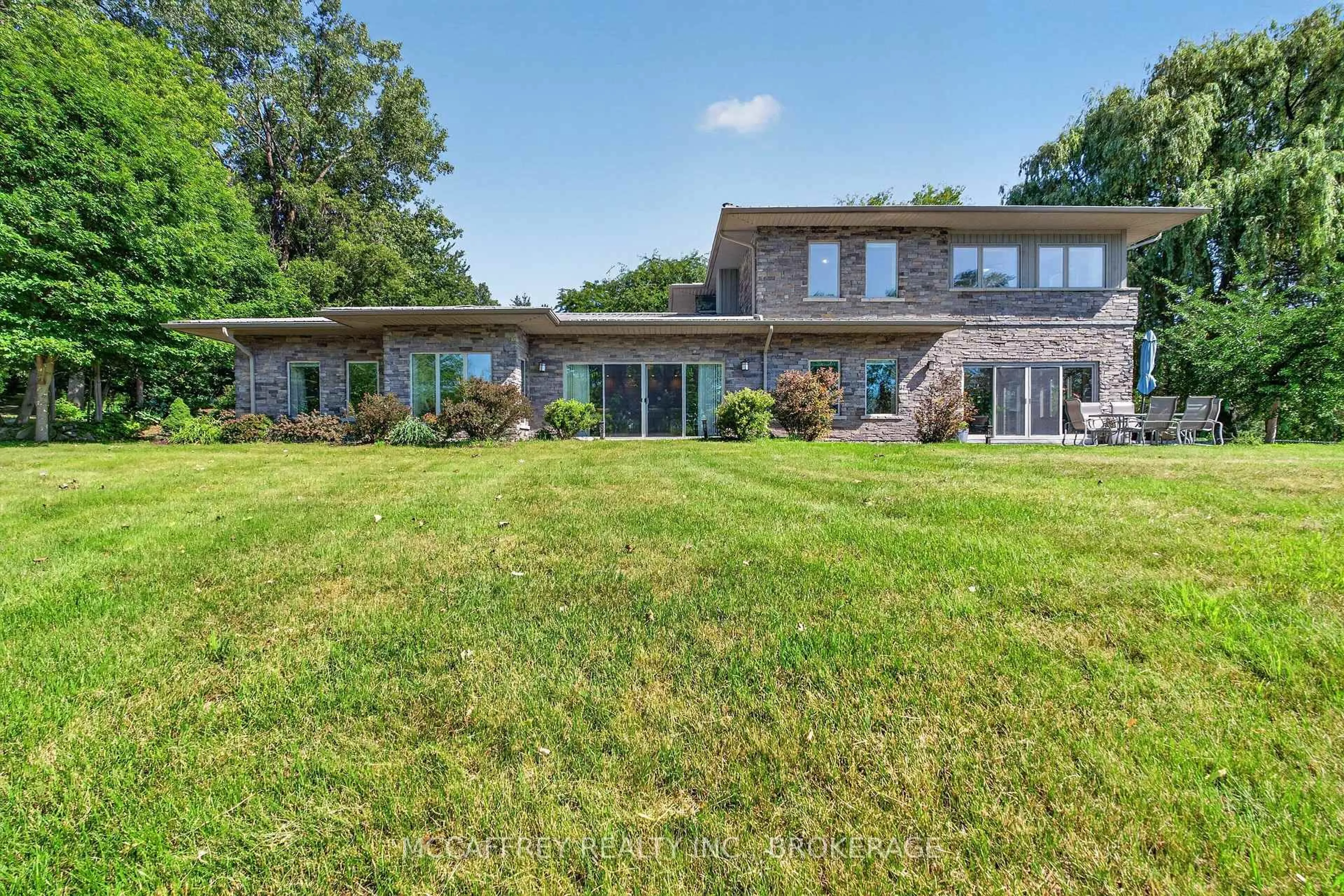 A pic from outside/outdoor area/front of a property/back of a property/a pic from drone, water/lake/river/ocean view for 5255 County Road 9, Napanee Ontario K7R 3K8