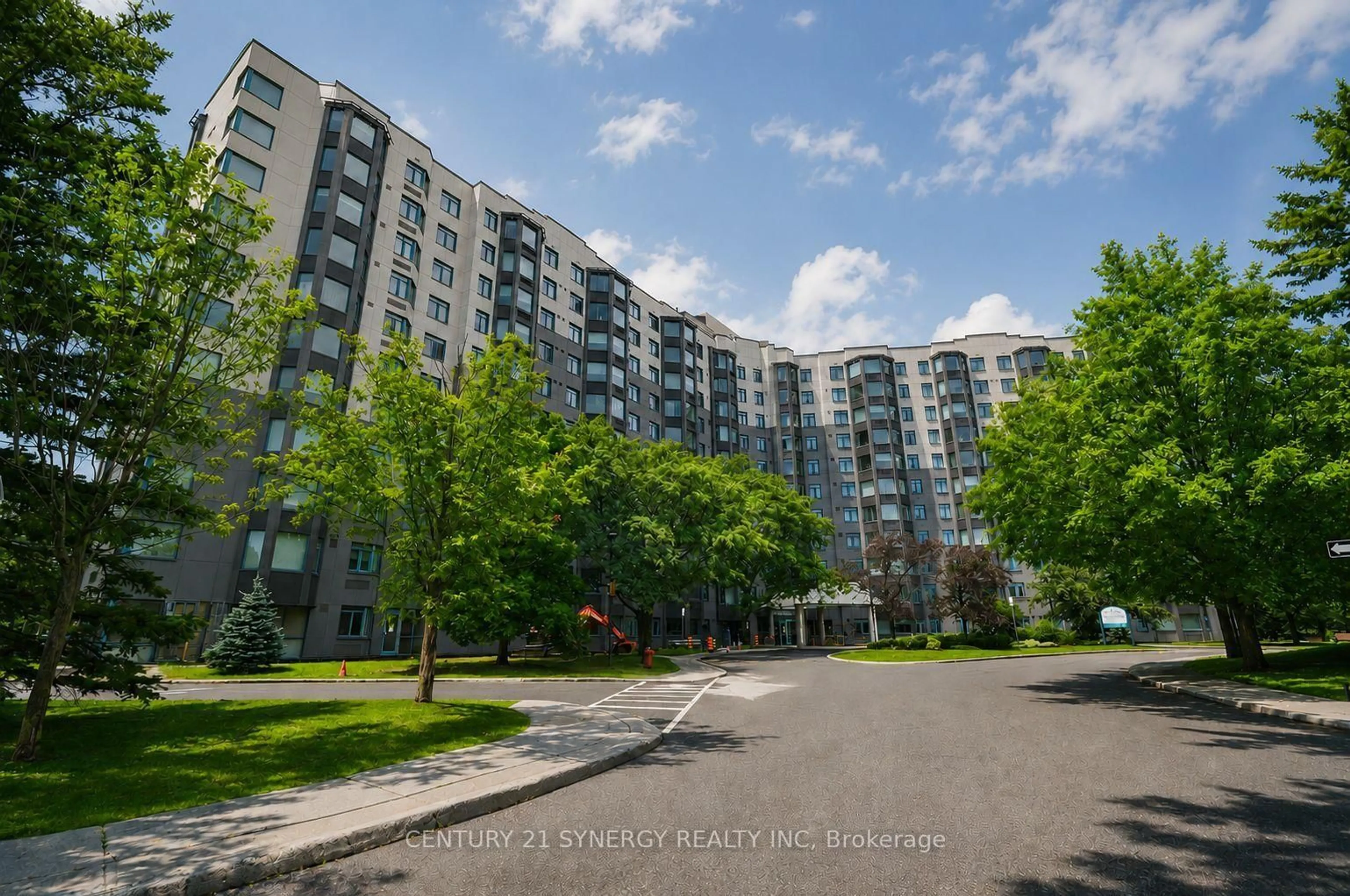 A pic from outside/outdoor area/front of a property/back of a property/a pic from drone, street for 1025 Grenon Ave #230, Ottawa Ontario K2B 8S5