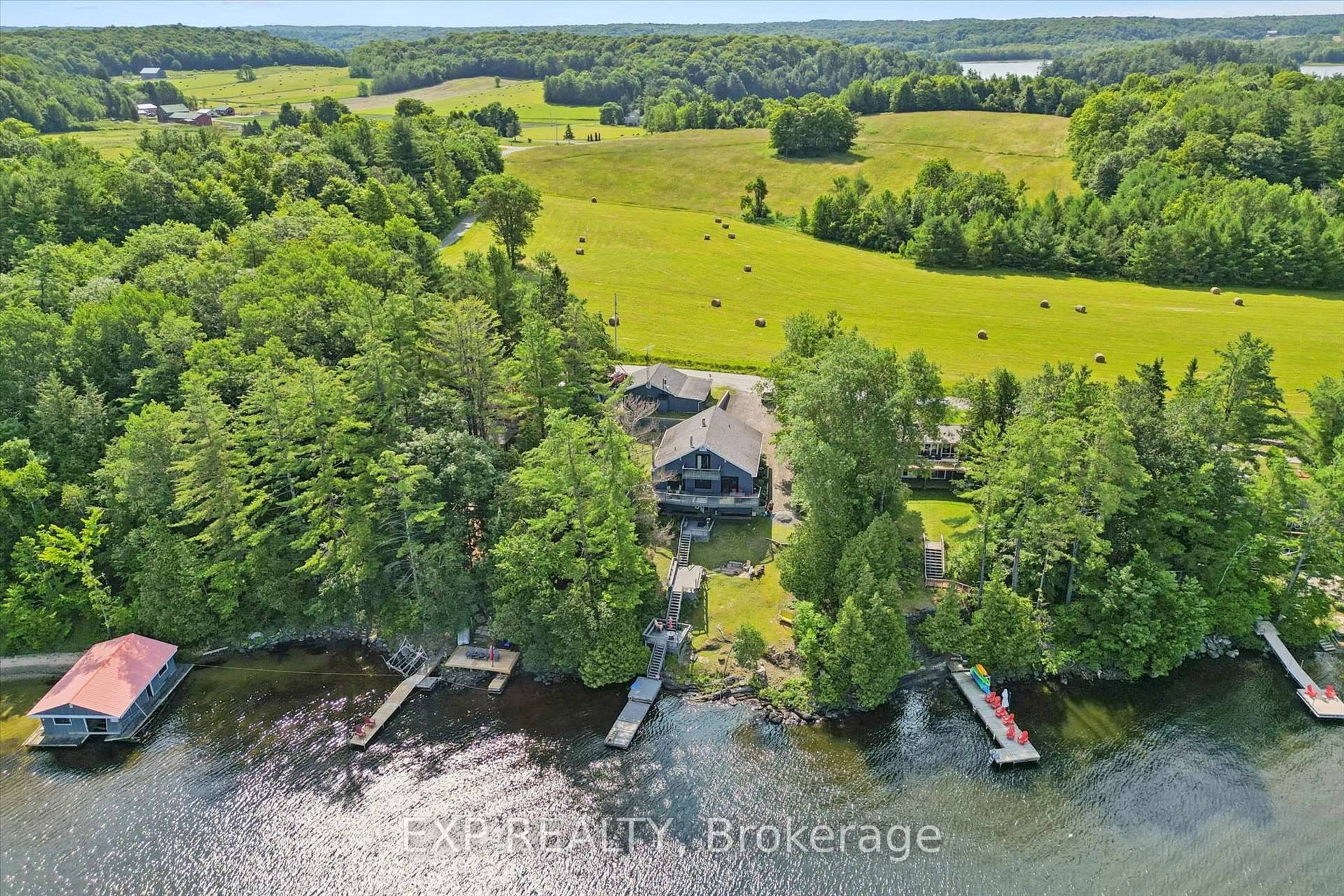 A pic from outside/outdoor area/front of a property/back of a property/a pic from drone, water/lake/river/ocean view for 1378 THREE MILE LAKE Rd #3, Muskoka Lakes Ontario P0B 1M0