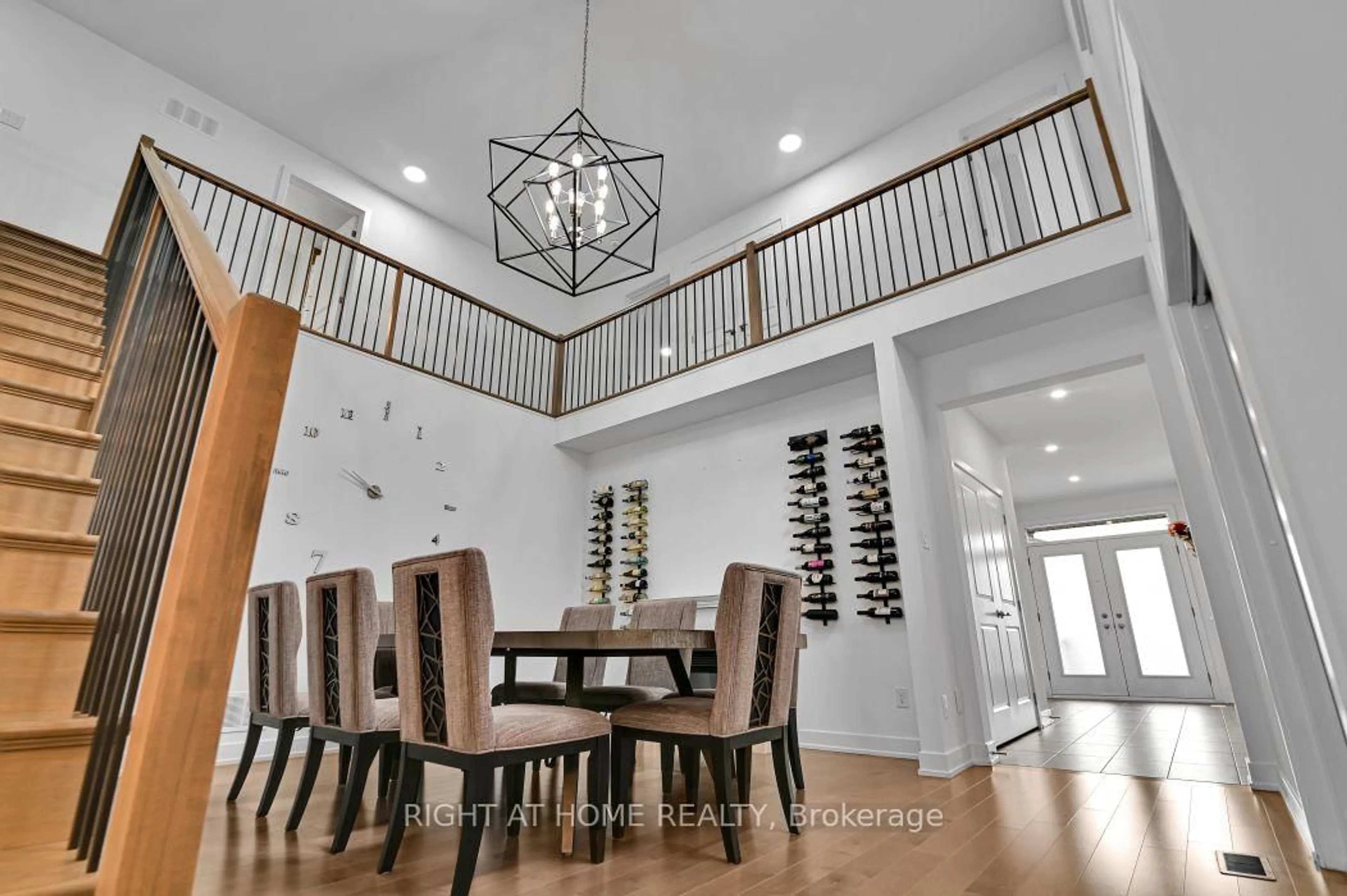 Dining room, wood/laminate floor for 32 Edenbridge Crt, Orleans Ontario K1W 0P1