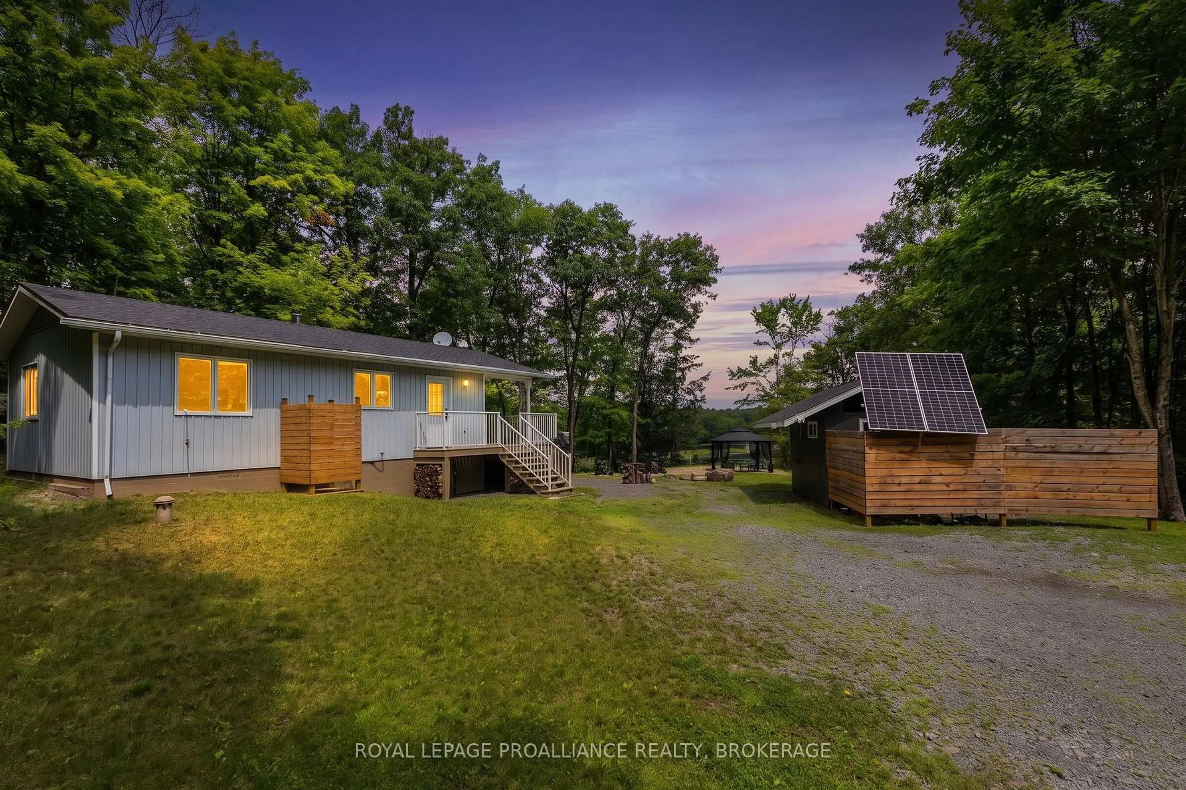 A pic from outside/outdoor area/front of a property/back of a property/a pic from drone, unknown for 59 Sunset Shores Lane, Godfrey Ontario K0H 1T0