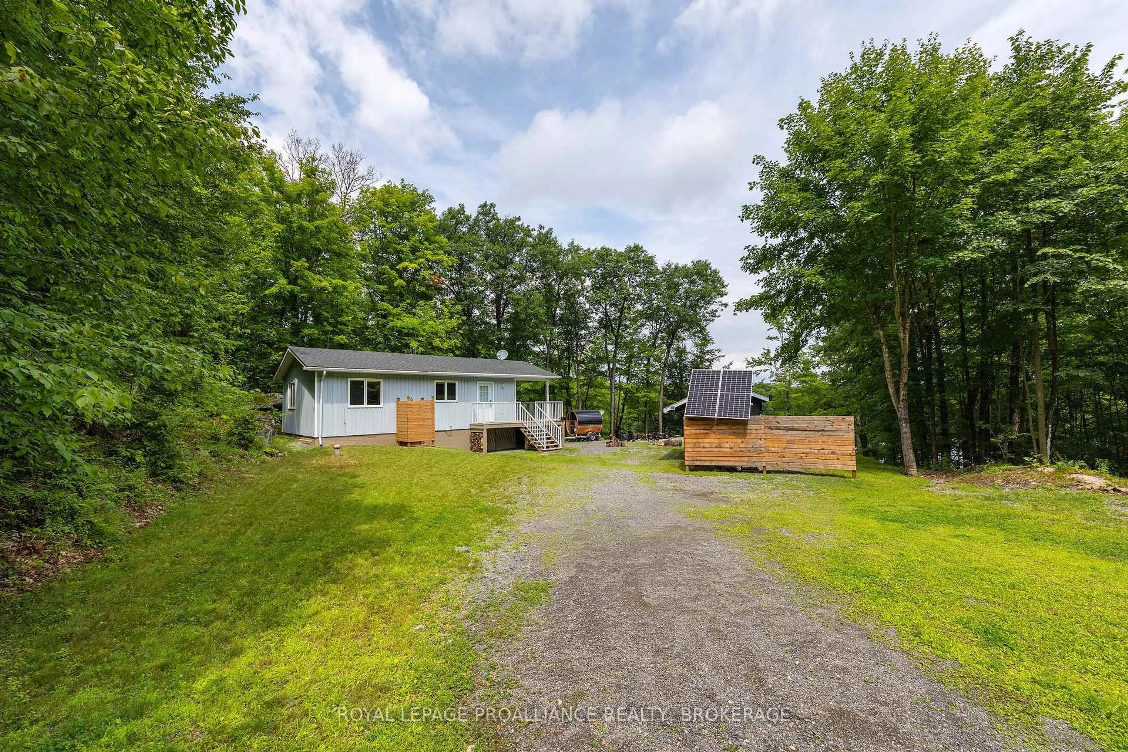 A pic from outside/outdoor area/front of a property/back of a property/a pic from drone, unknown for 59 Sunset Shores Lane, Godfrey Ontario K0H 1T0