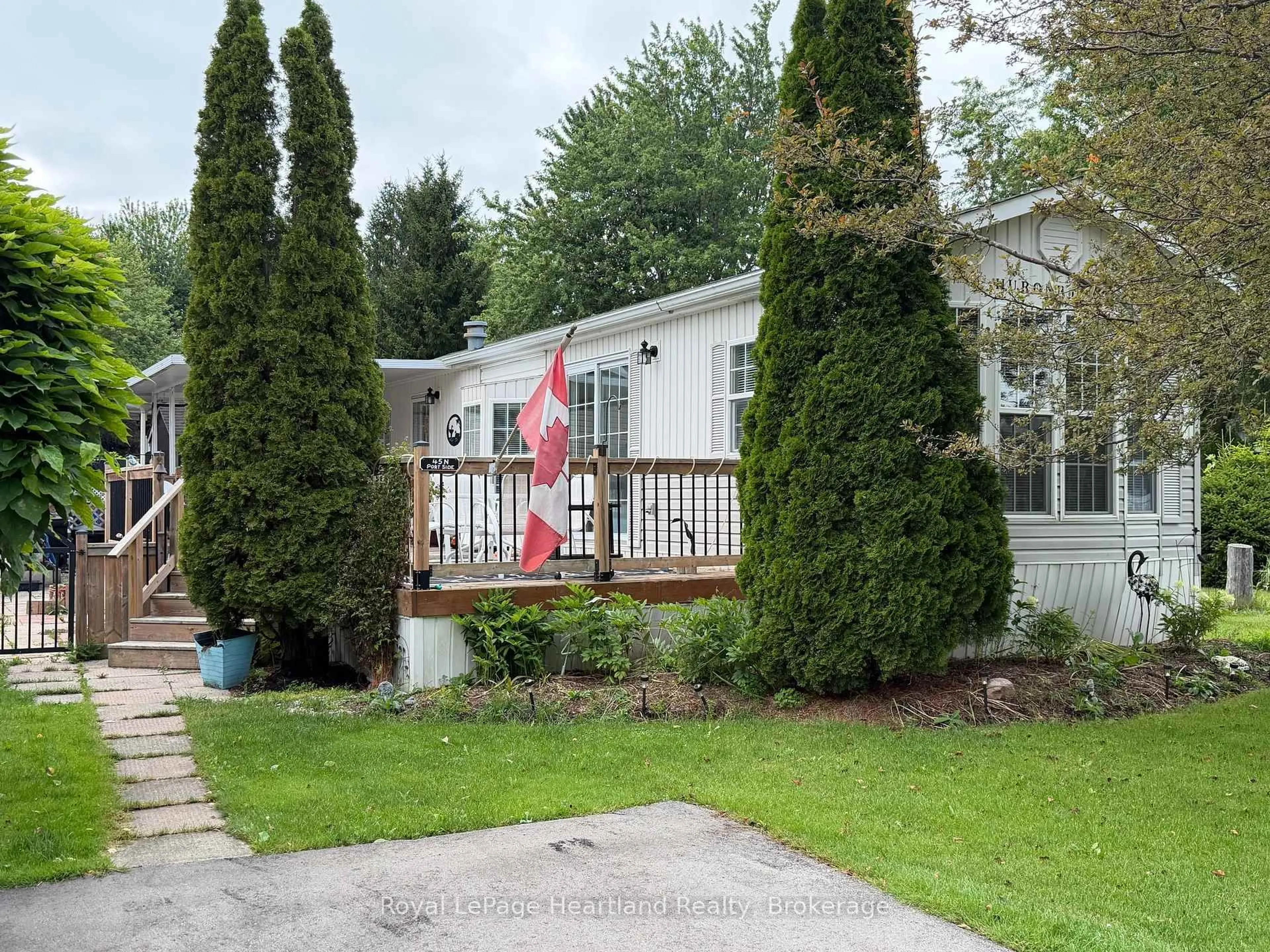 Home with vinyl exterior material, street for 77719 BLUEWATER HWY-45 PORTSIDE Highway, Central Huron Ontario N0M 1G0