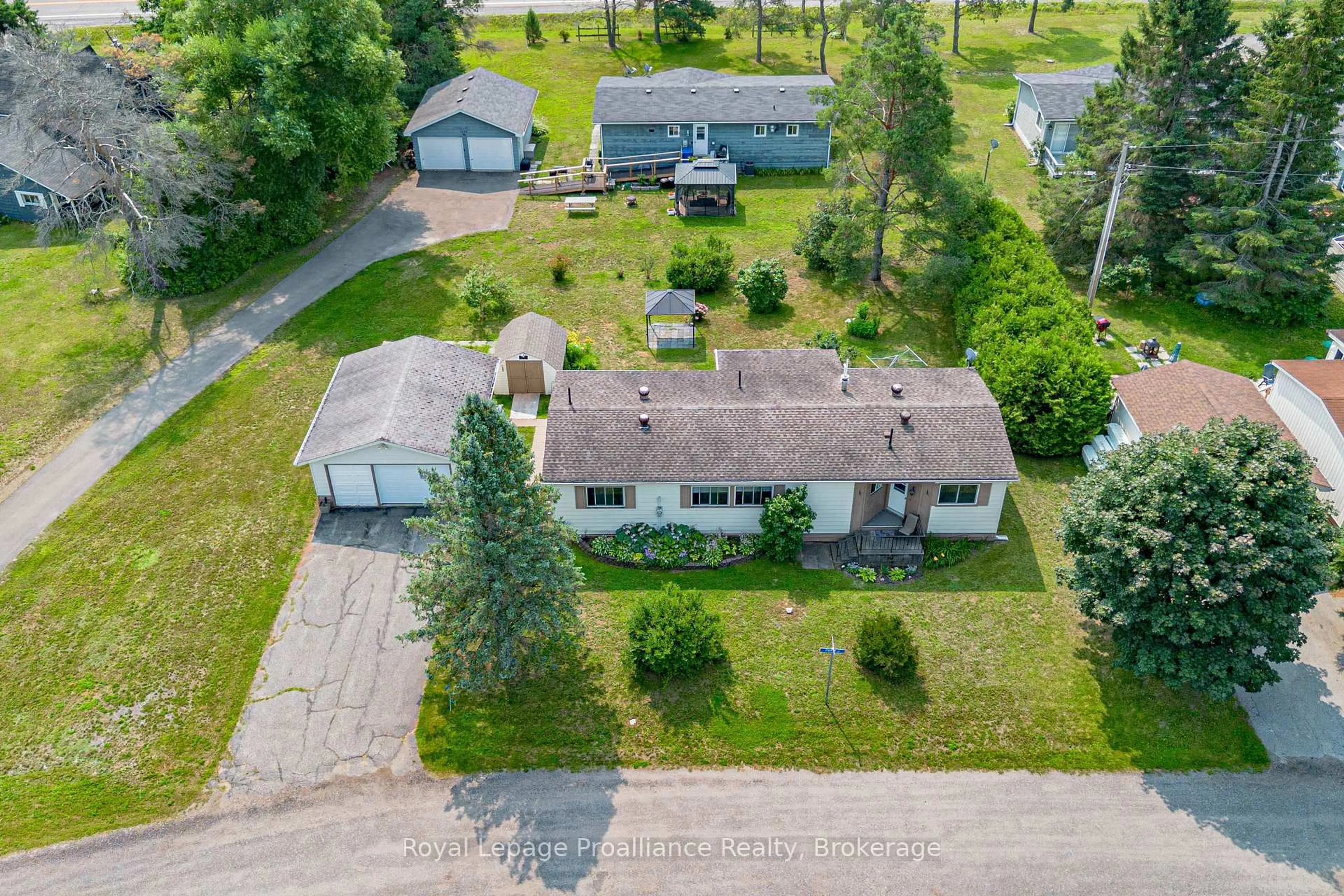 A pic from outside/outdoor area/front of a property/back of a property/a pic from drone, street for 1064 Eighth Lane, Minden Hills Ontario K0M 2K0