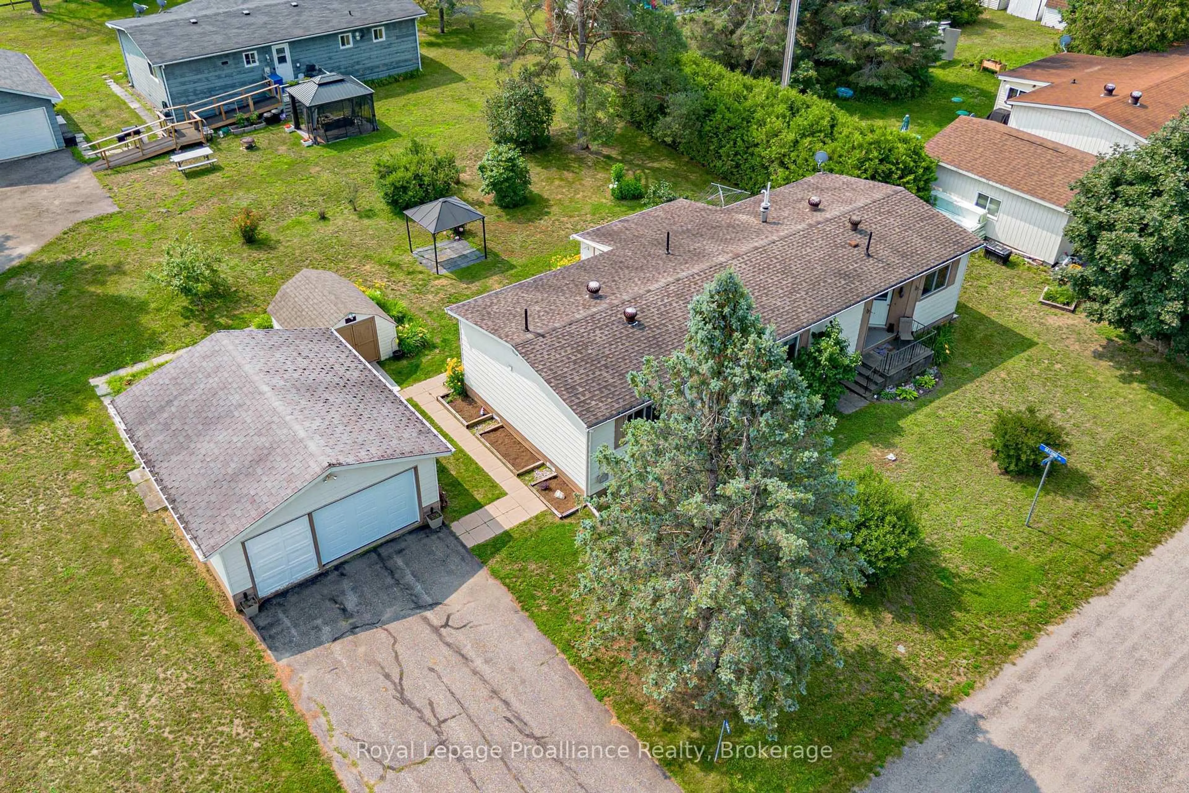 A pic from outside/outdoor area/front of a property/back of a property/a pic from drone, street for 1064 Eighth Lane, Minden Hills Ontario K0M 2K0