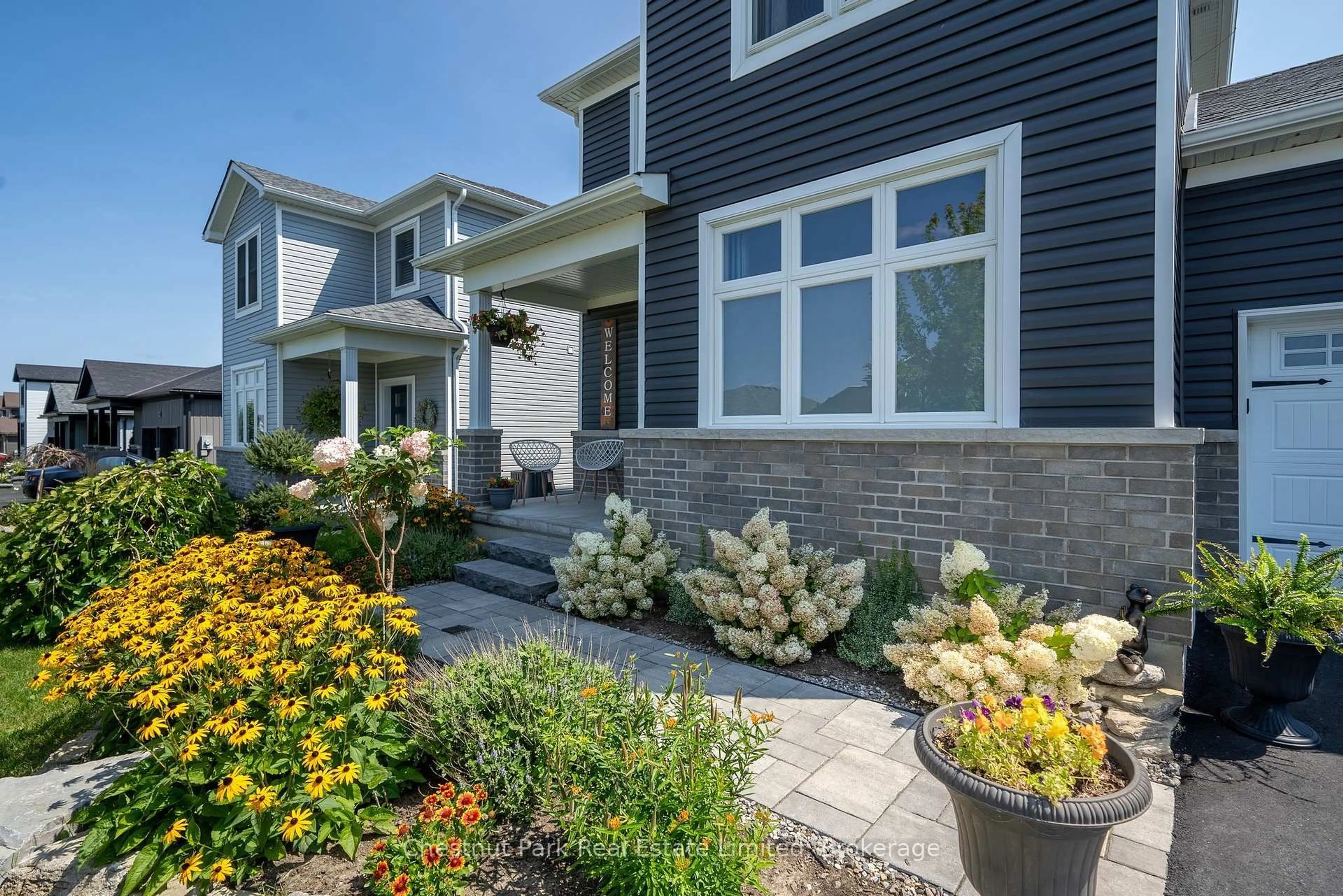 Home with brick exterior material, street for 18 Curtis St, Prince Edward County Ontario K0K 2T0