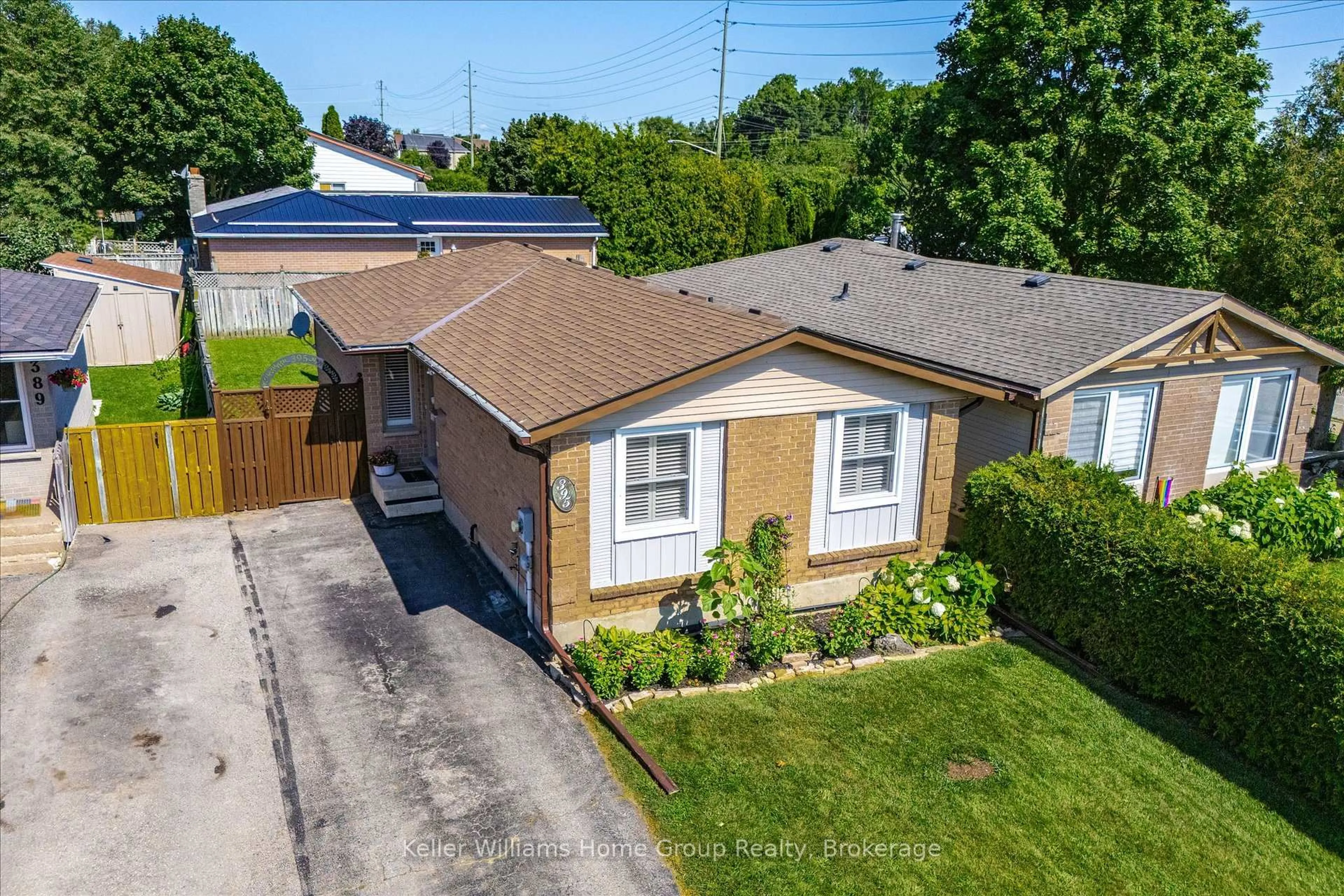 A pic from outside/outdoor area/front of a property/back of a property/a pic from drone, street for 395 Strathallan St, Centre Wellington Ontario N1M 3L3