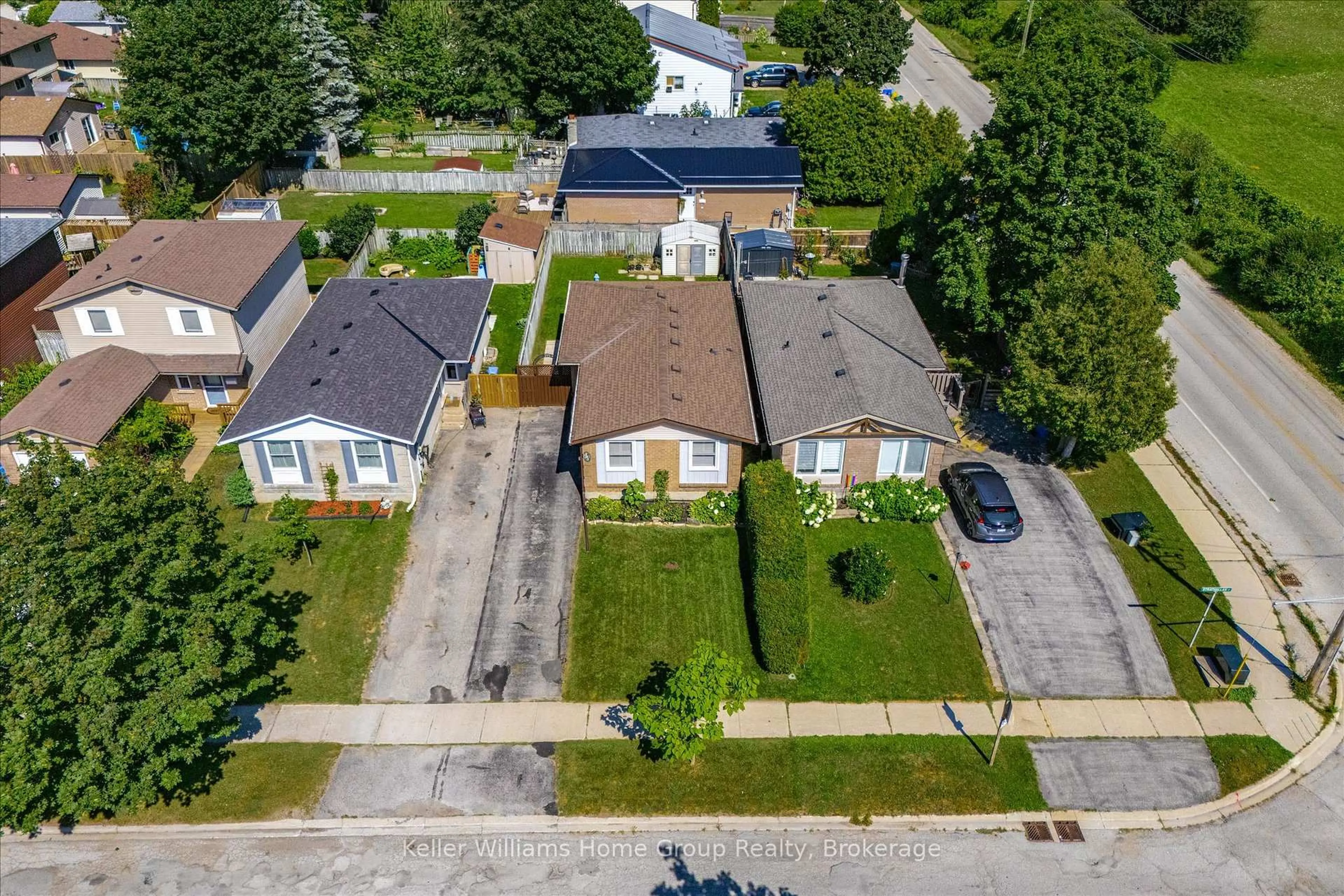 A pic from outside/outdoor area/front of a property/back of a property/a pic from drone, street for 395 Strathallan St, Centre Wellington Ontario N1M 3L3
