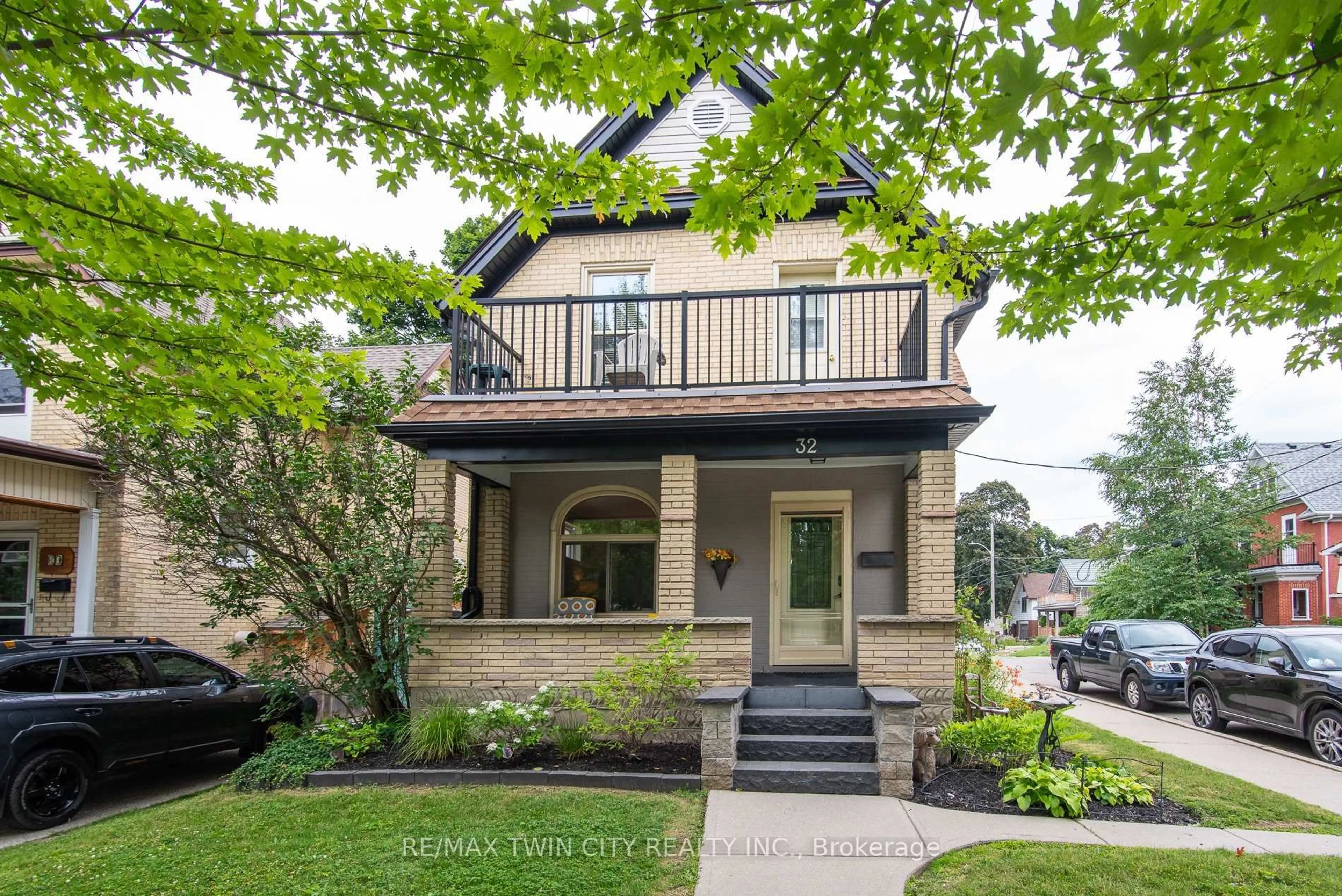 Home with brick exterior material, street for 32 Samuel St, Kitchener Ontario N2H 1P1