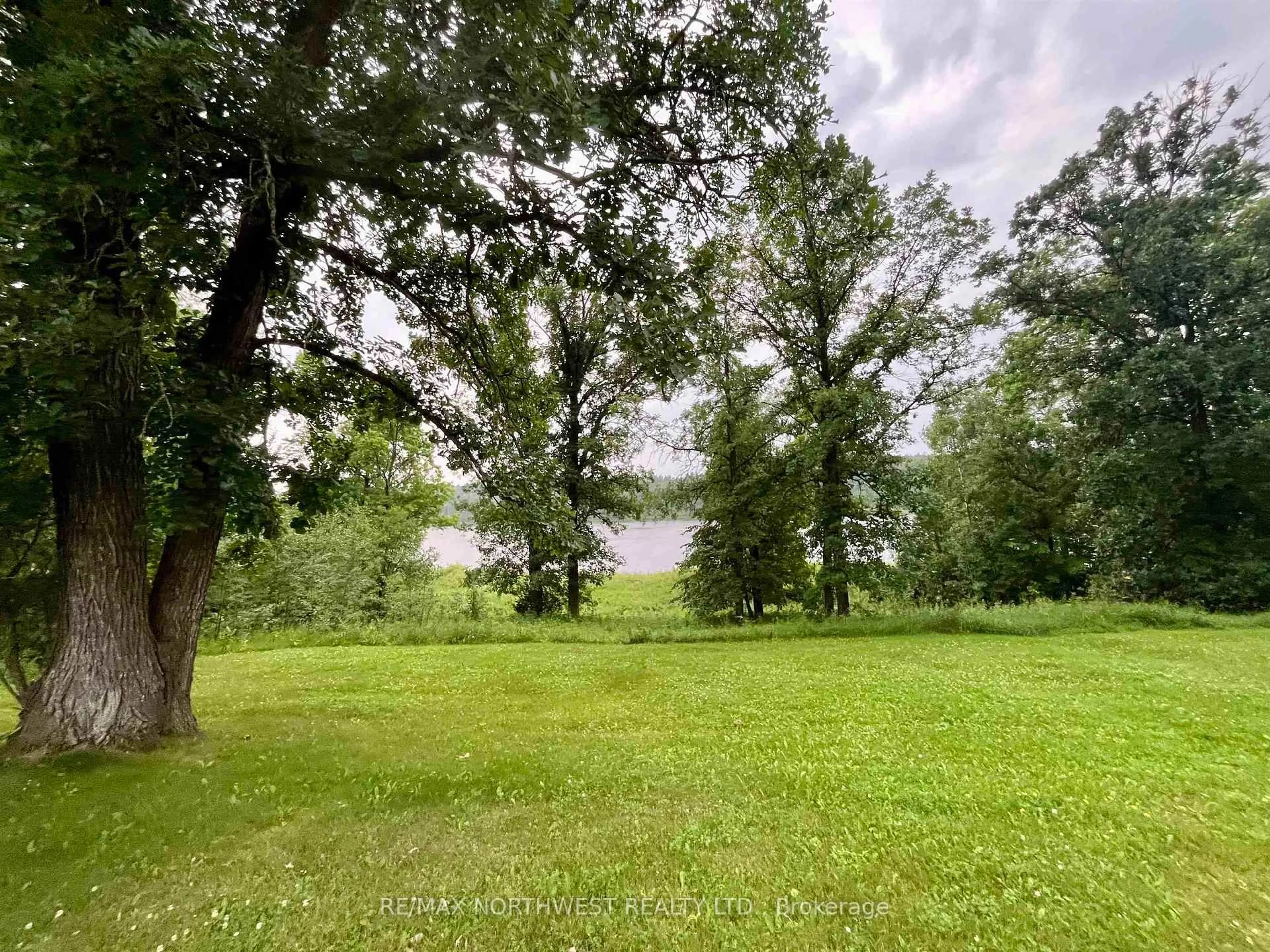 A pic from outside/outdoor area/front of a property/back of a property/a pic from drone, forest/trees view for 986 HWY 11, Dawson Ontario P0W 1K0