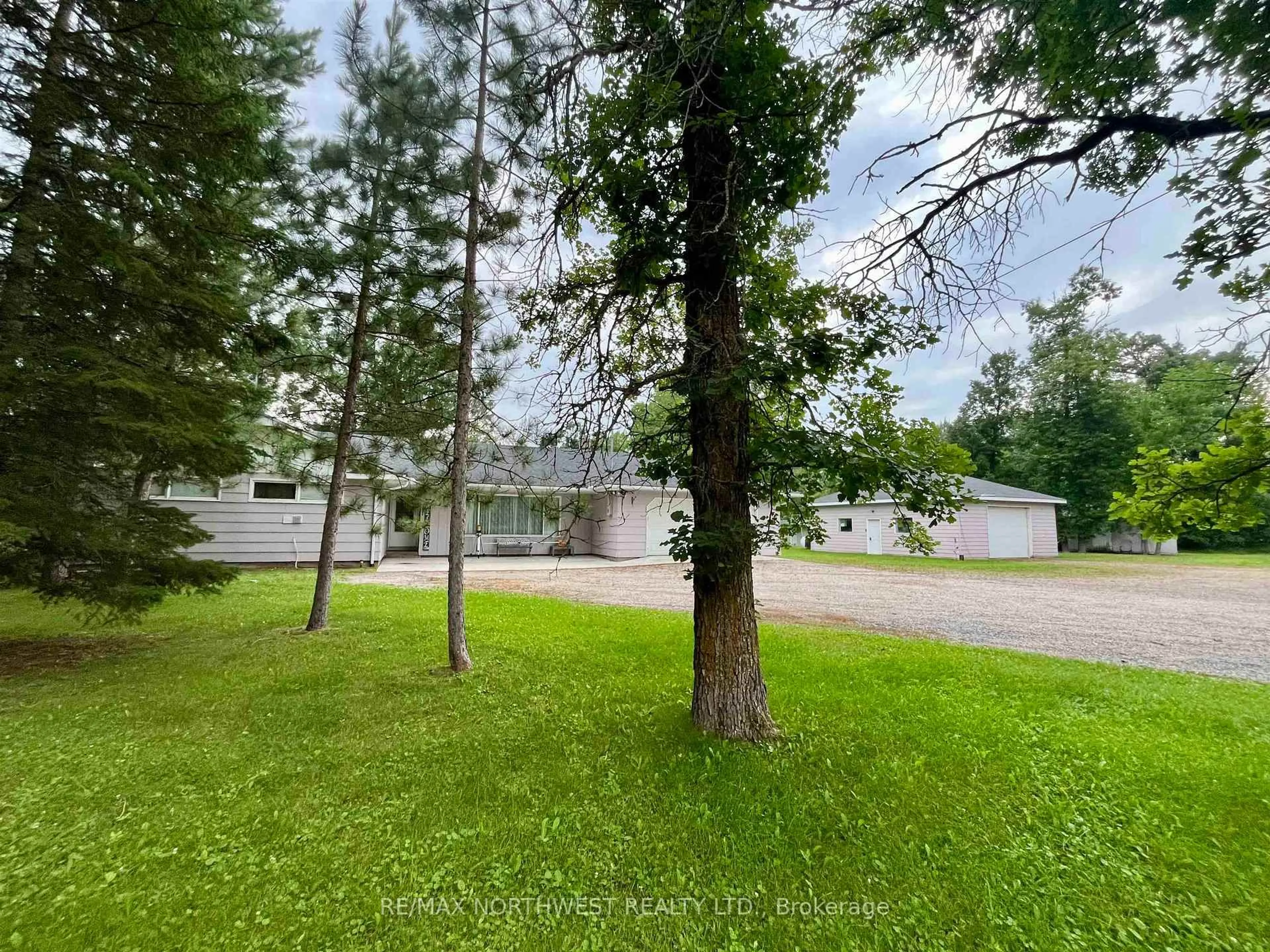 A pic from outside/outdoor area/front of a property/back of a property/a pic from drone, forest/trees view for 986 HWY 11, Dawson Ontario P0W 1K0