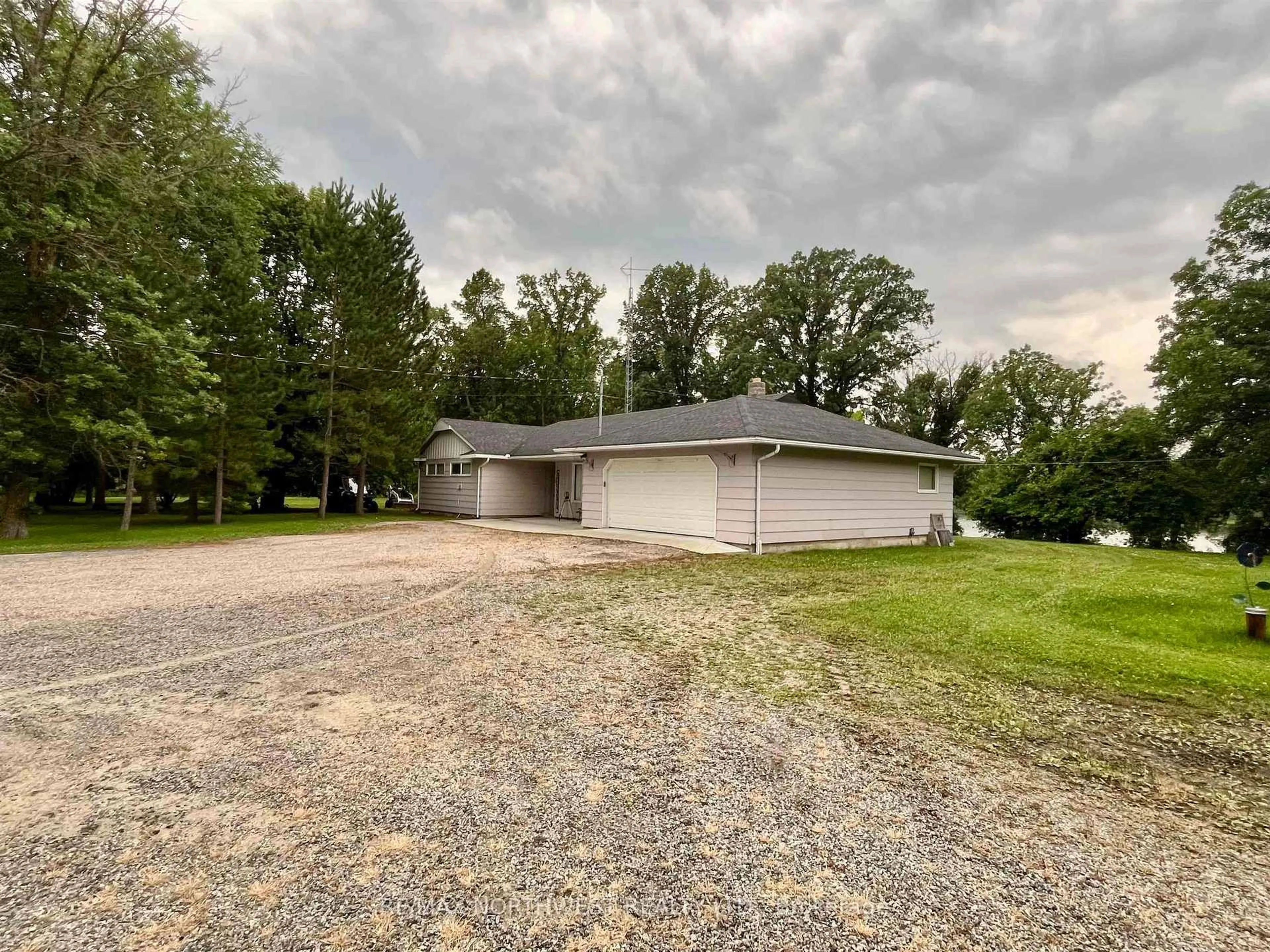 A pic from outside/outdoor area/front of a property/back of a property/a pic from drone, unknown for 986 HWY 11, Dawson Ontario P0W 1K0