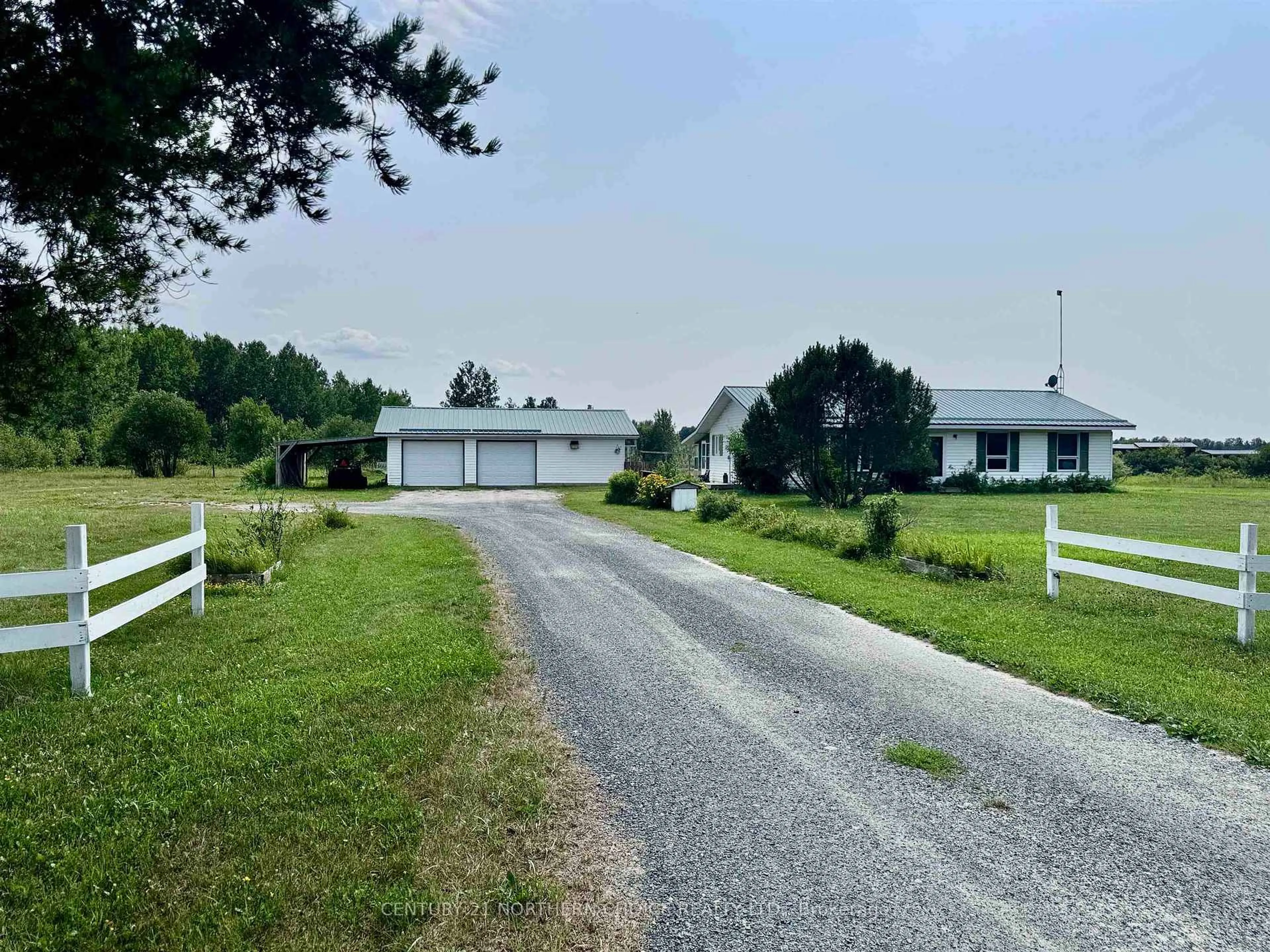 A pic from outside/outdoor area/front of a property/back of a property/a pic from drone, street for 175 Frog Creek Rd, Alberton Ontario P9A 3M2