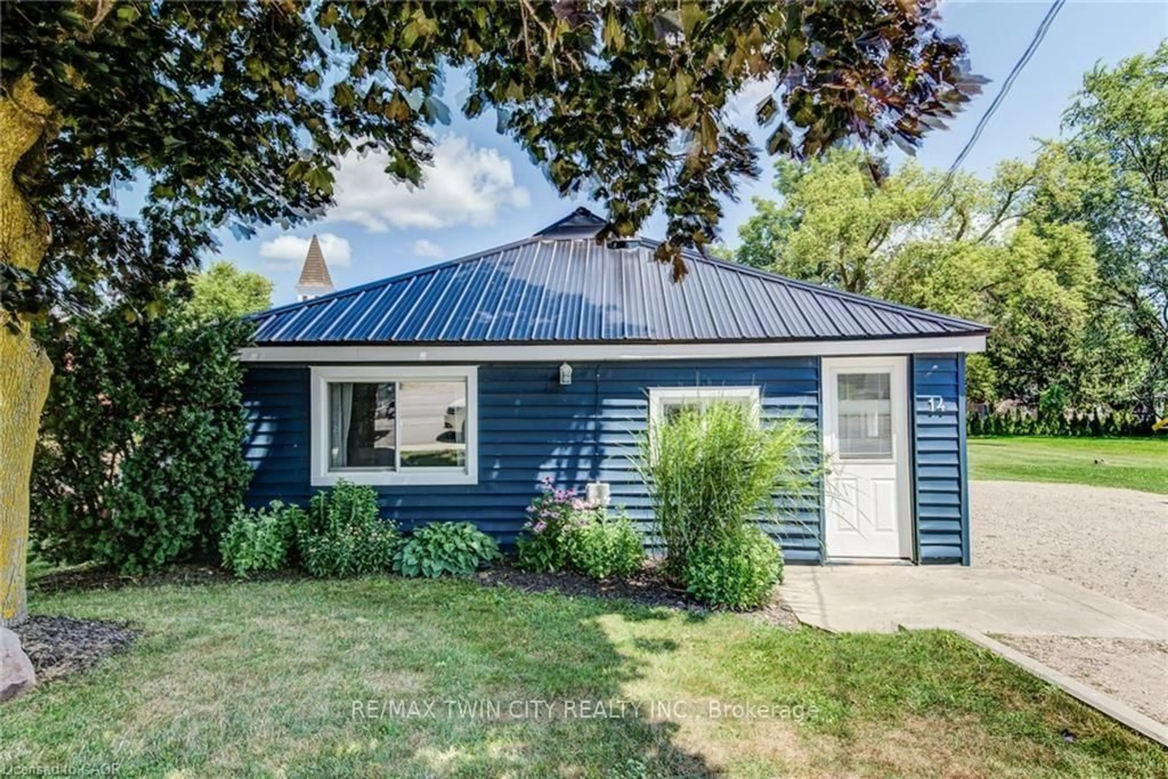 Home with vinyl exterior material, street for 14 Maddison St, West Perth Ontario N0K 1P0
