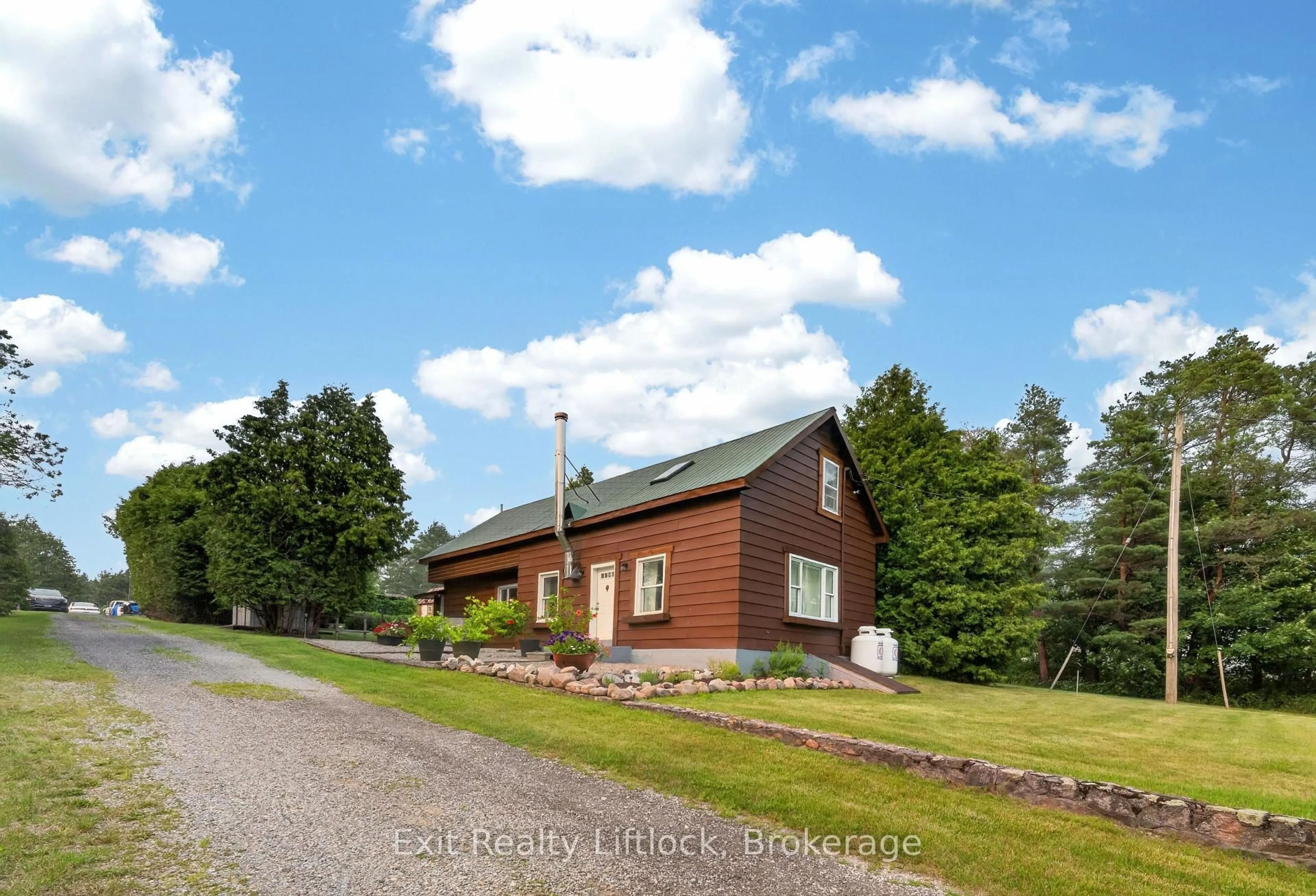 A pic from outside/outdoor area/front of a property/back of a property/a pic from drone, unknown for 133 Farmers Rd, Kawartha Lakes Ontario L0A 1K0