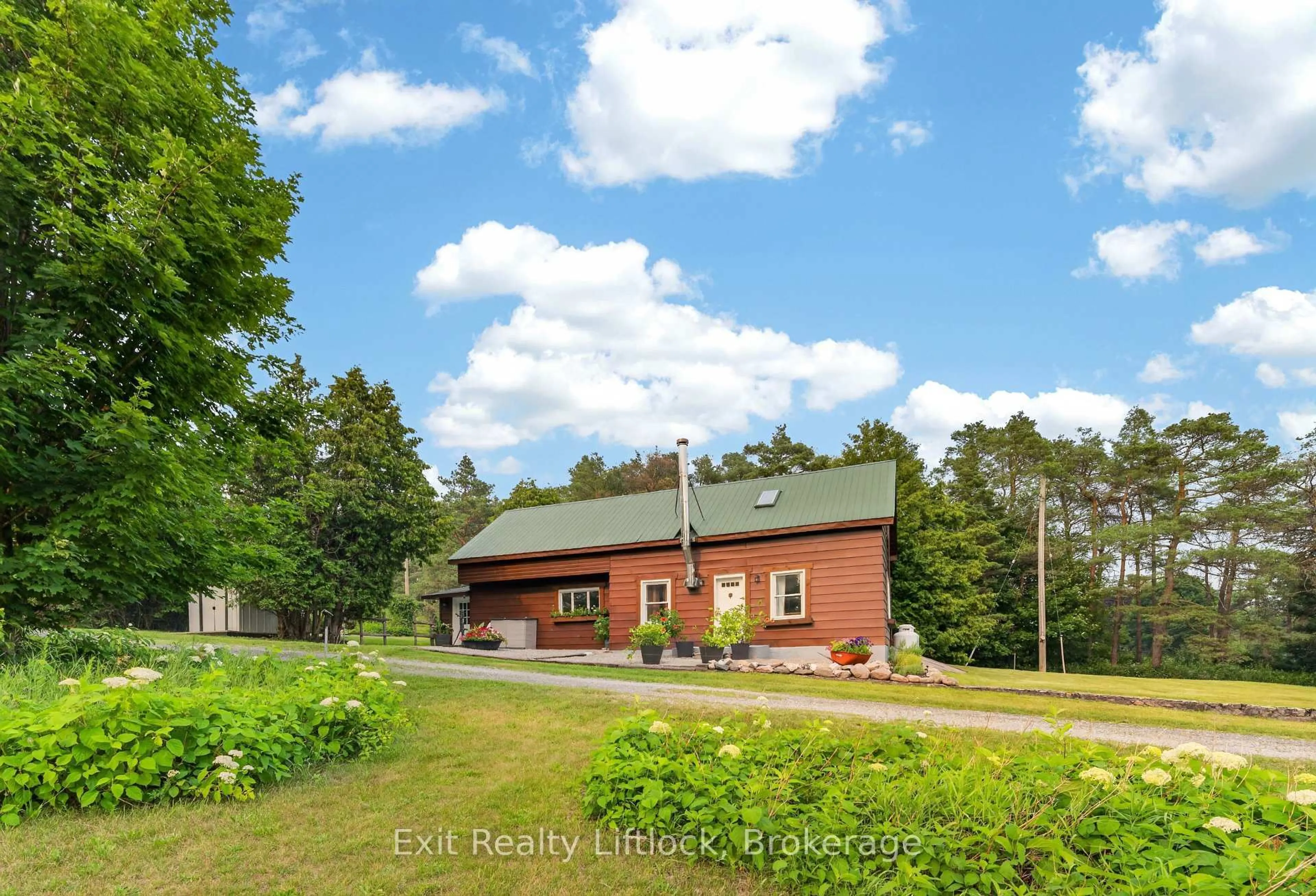 A pic from outside/outdoor area/front of a property/back of a property/a pic from drone, unknown for 133 Farmers Rd, Kawartha Lakes Ontario L0A 1K0