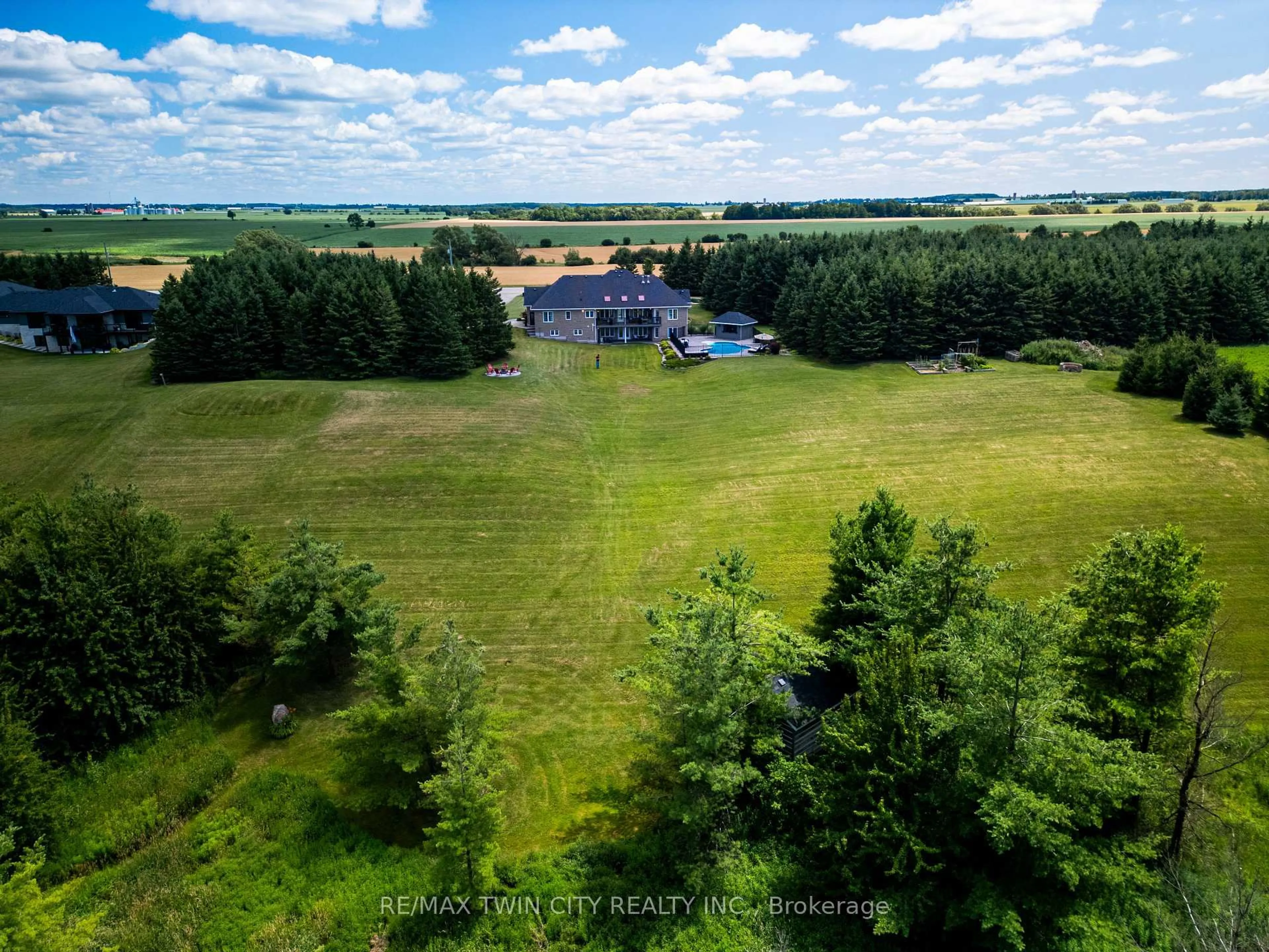 A pic from outside/outdoor area/front of a property/back of a property/a pic from drone, unknown for 7118 Wellington Rd 11 Rd, Mapleton Ontario N0G 1P0