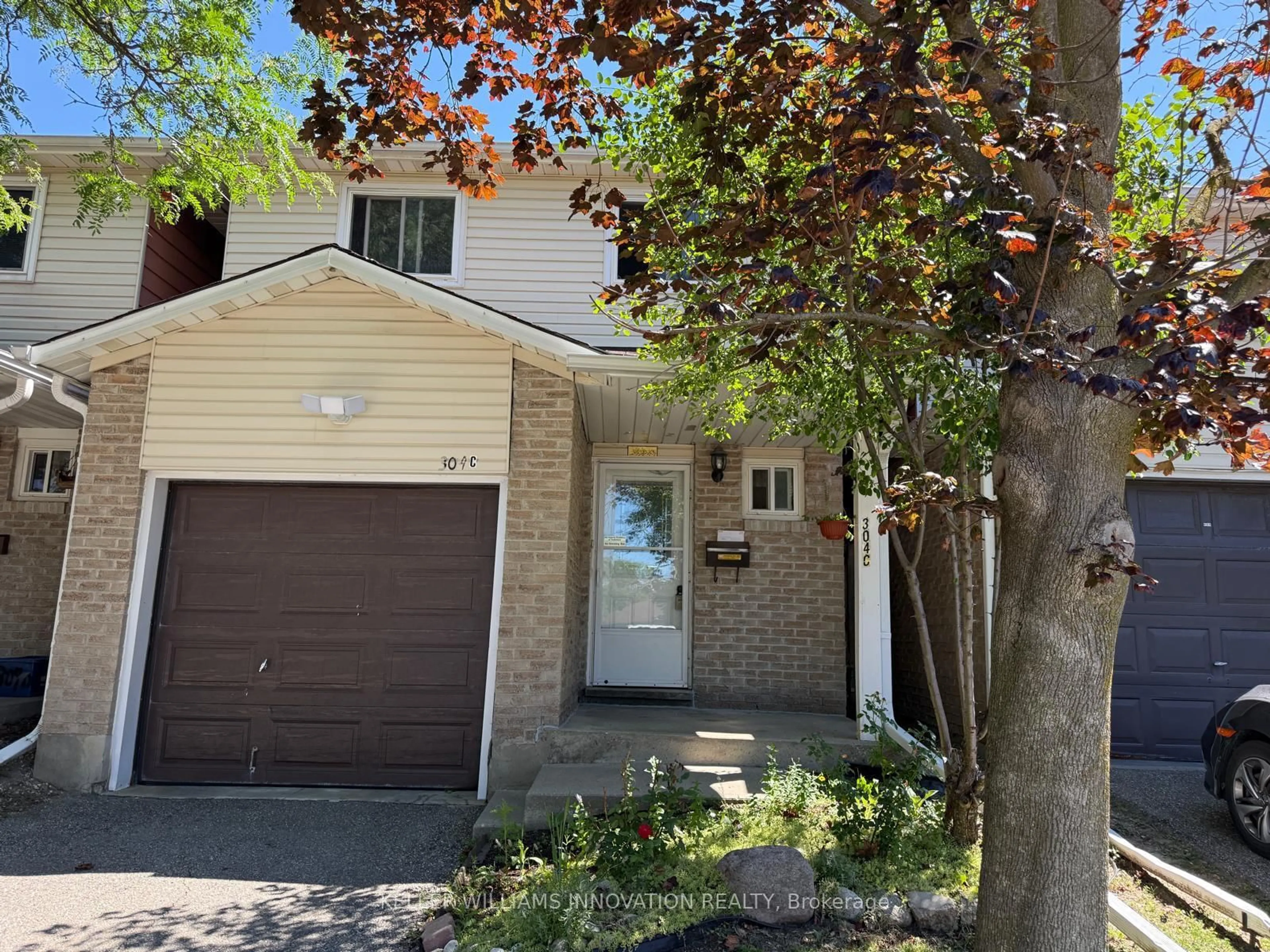 A pic from outside/outdoor area/front of a property/back of a property/a pic from drone, street for 304 Bluevale St #C, Waterloo Ontario N2J 4G3