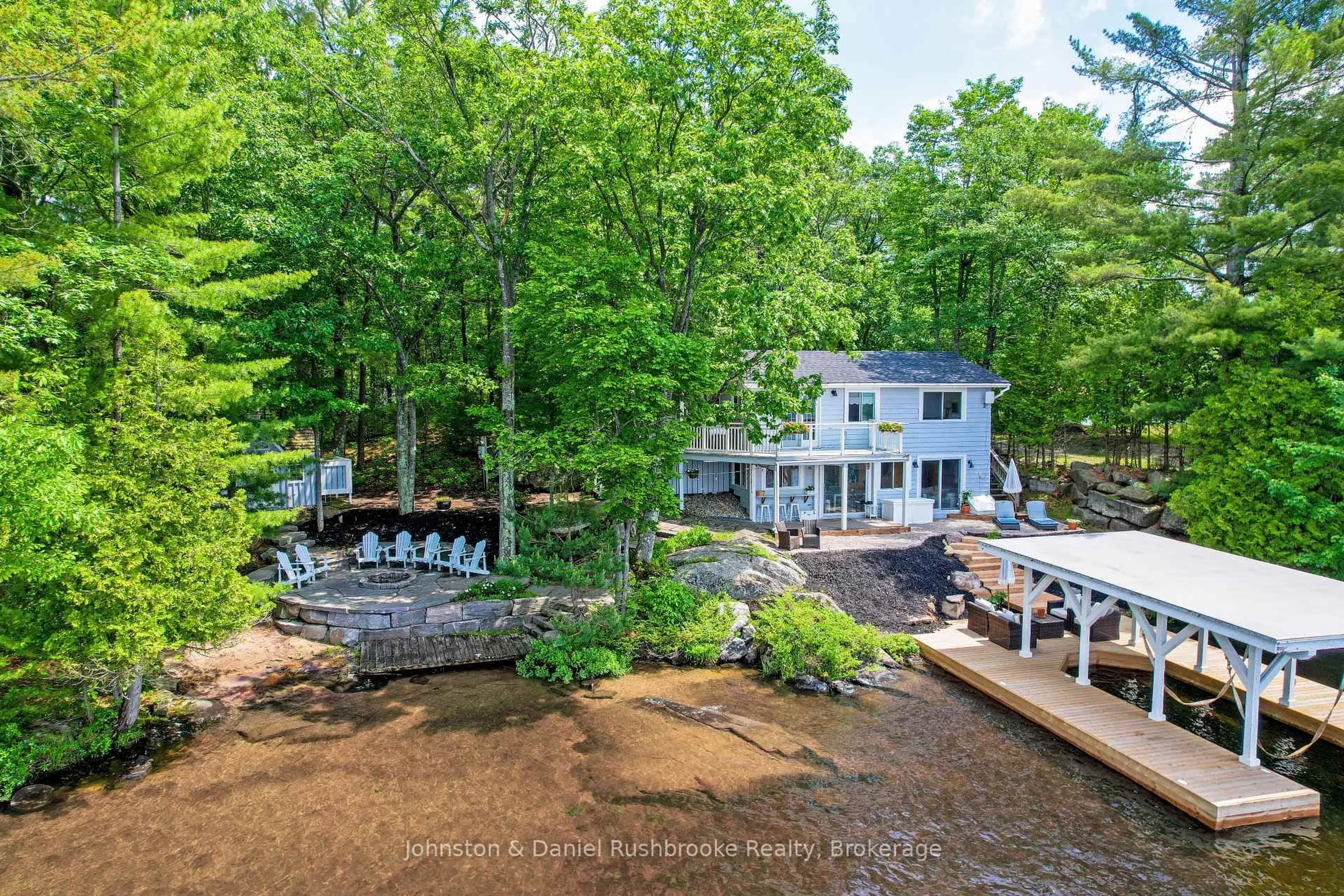 A pic from outside/outdoor area/front of a property/back of a property/a pic from drone, water/lake/river/ocean view for 44-2755 Muskoka Rd 118 West (Hutton Road), Muskoka Lakes Ontario P0B 1J0