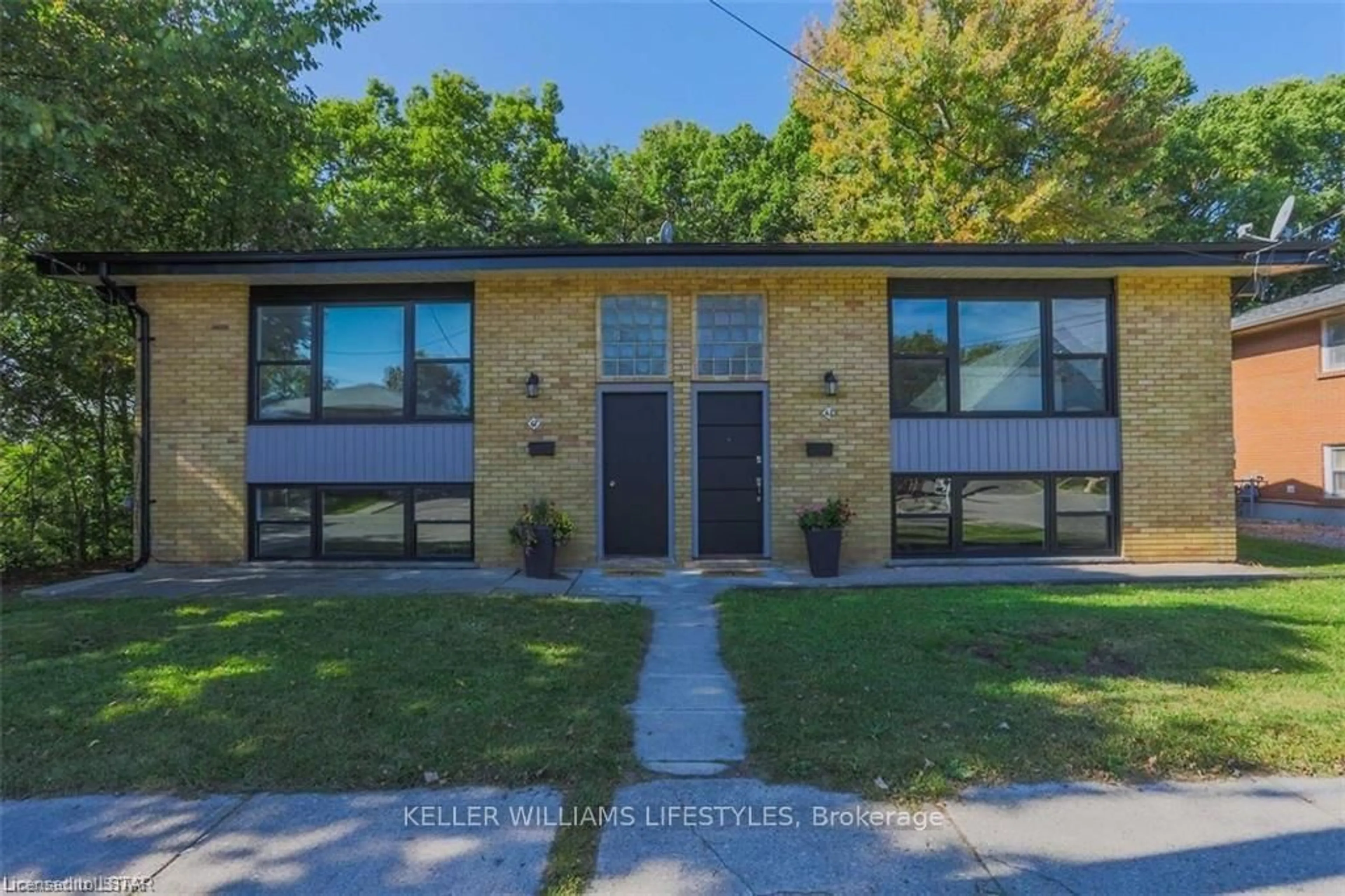 Home with brick exterior material, building for 61-63 DILLABOUGH St, London East Ontario N5Z 2B9