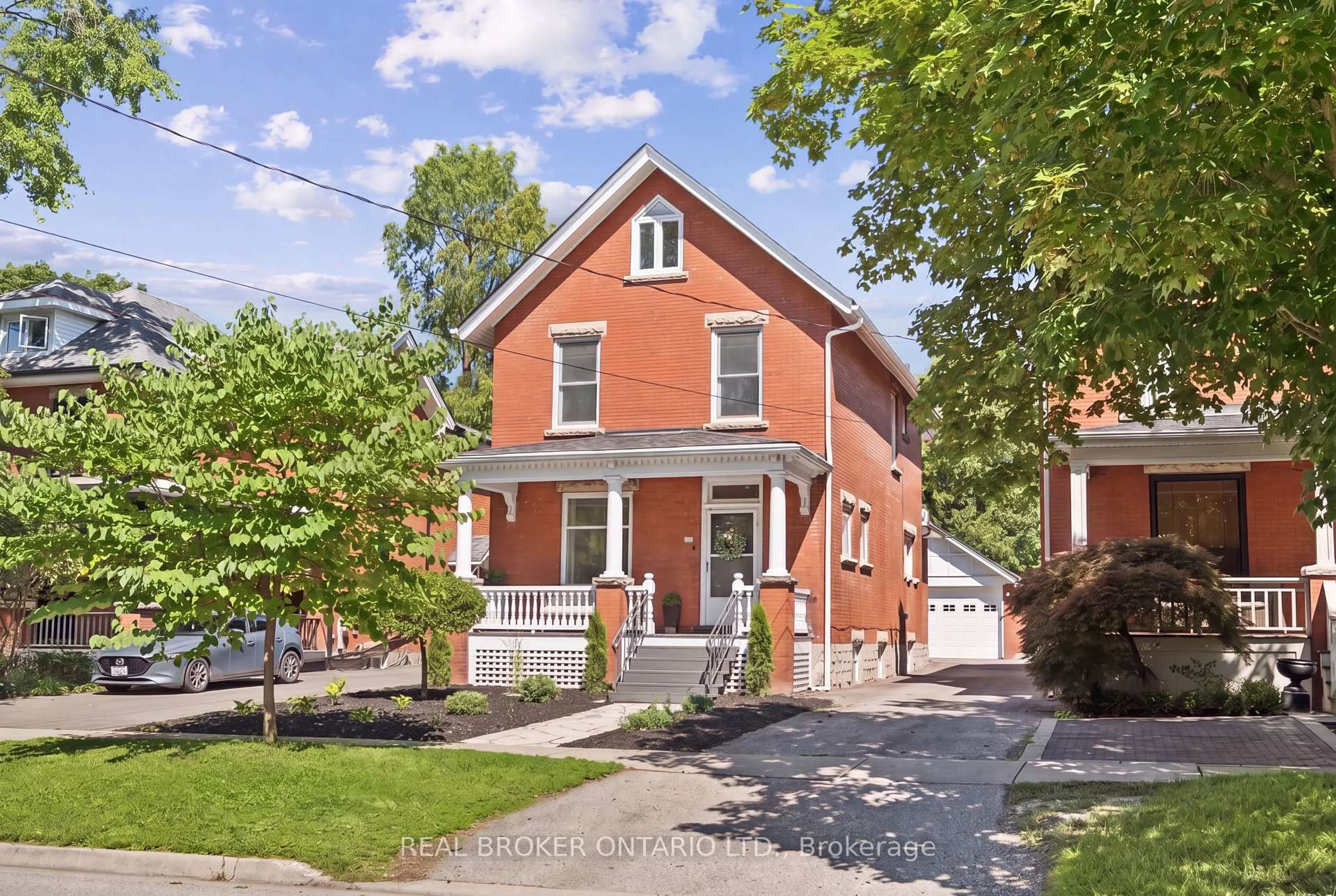 Home with brick exterior material, street for 25 Suffolk St, Guelph Ontario N1H 2H9